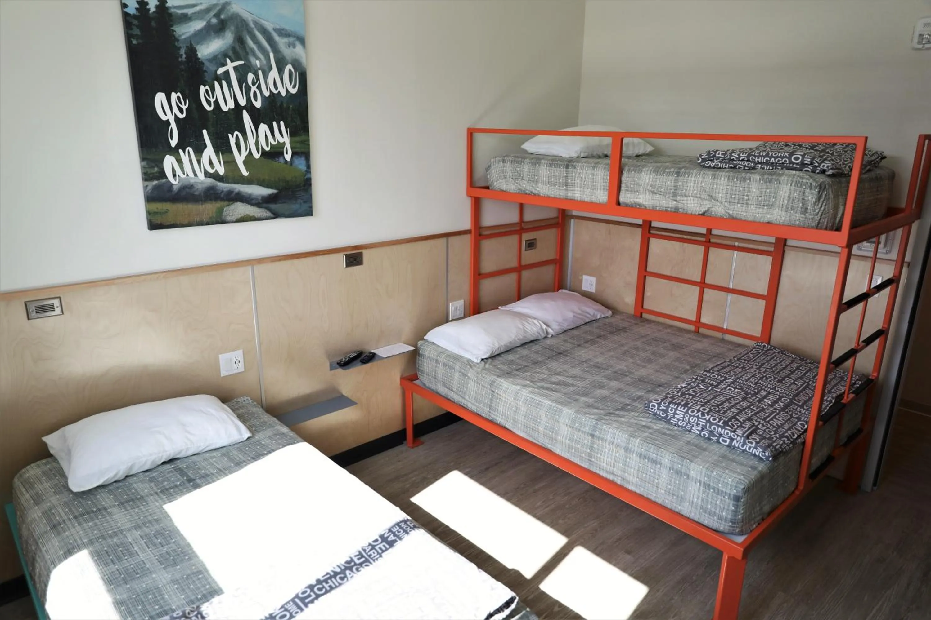 group of guests, Bed in Canmore Downtown Hostel