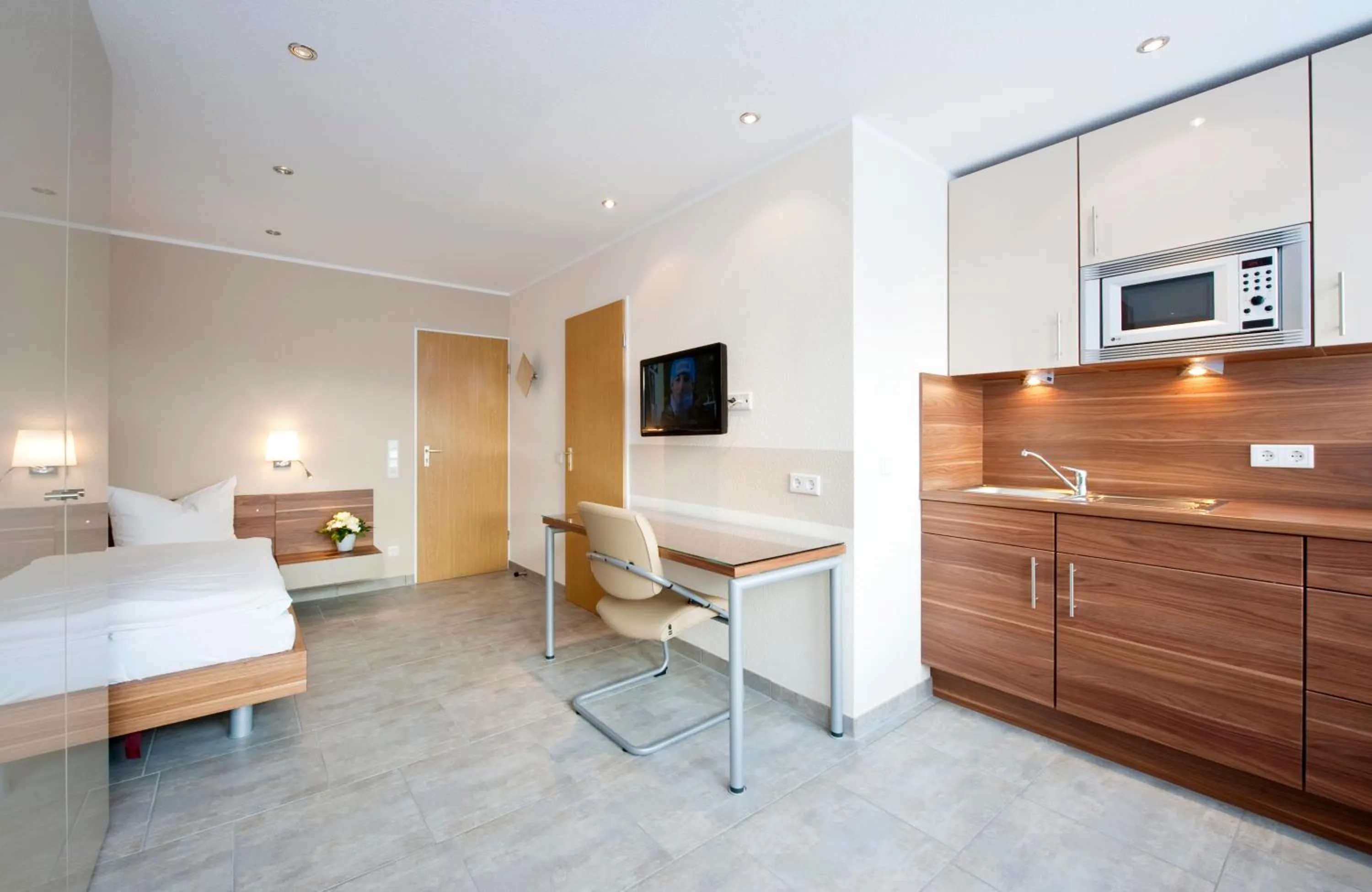 Kitchen or kitchenette, Bed in Appartements am Kleeblatt