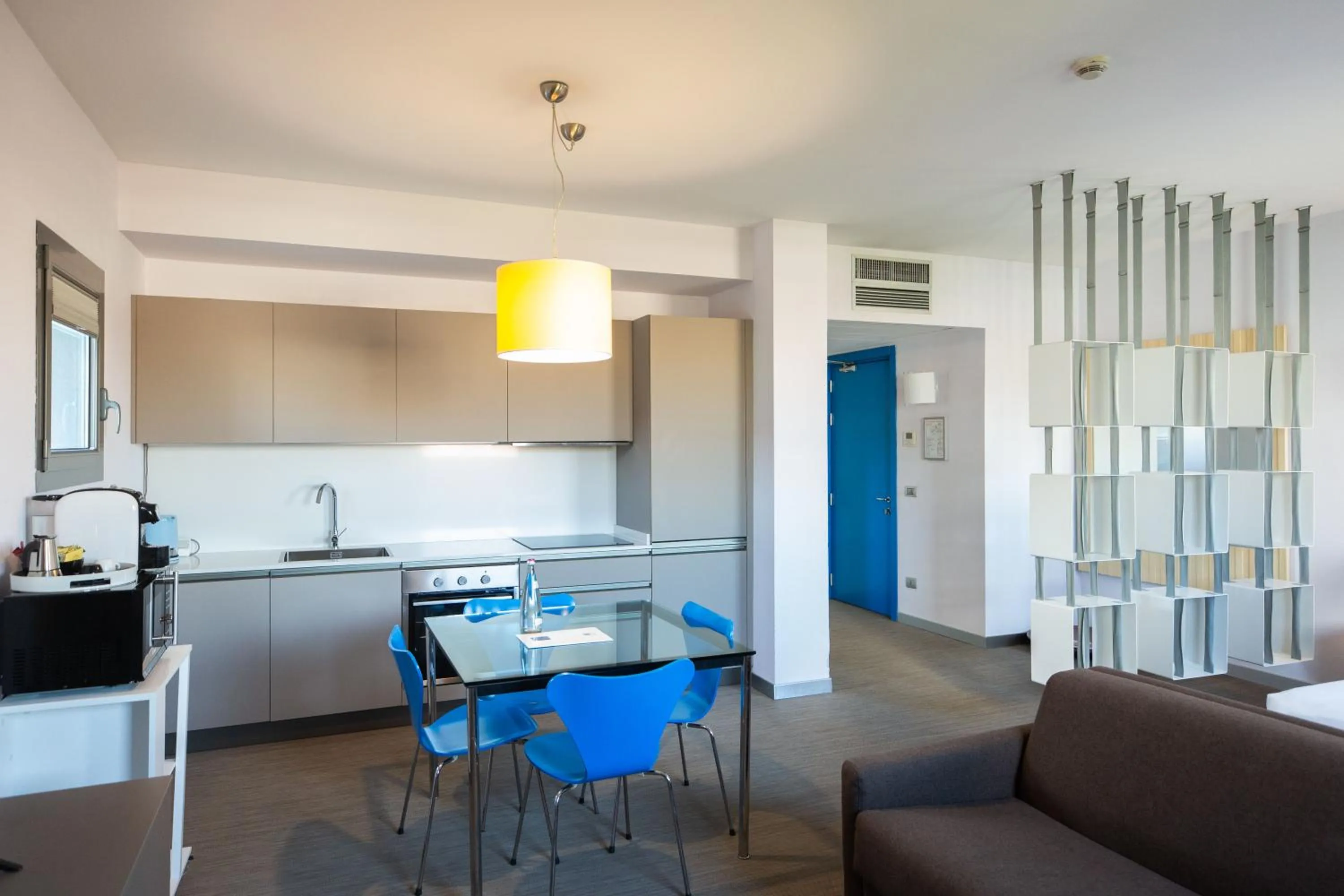 Kitchen or kitchenette in Zambala Luxury Apartments