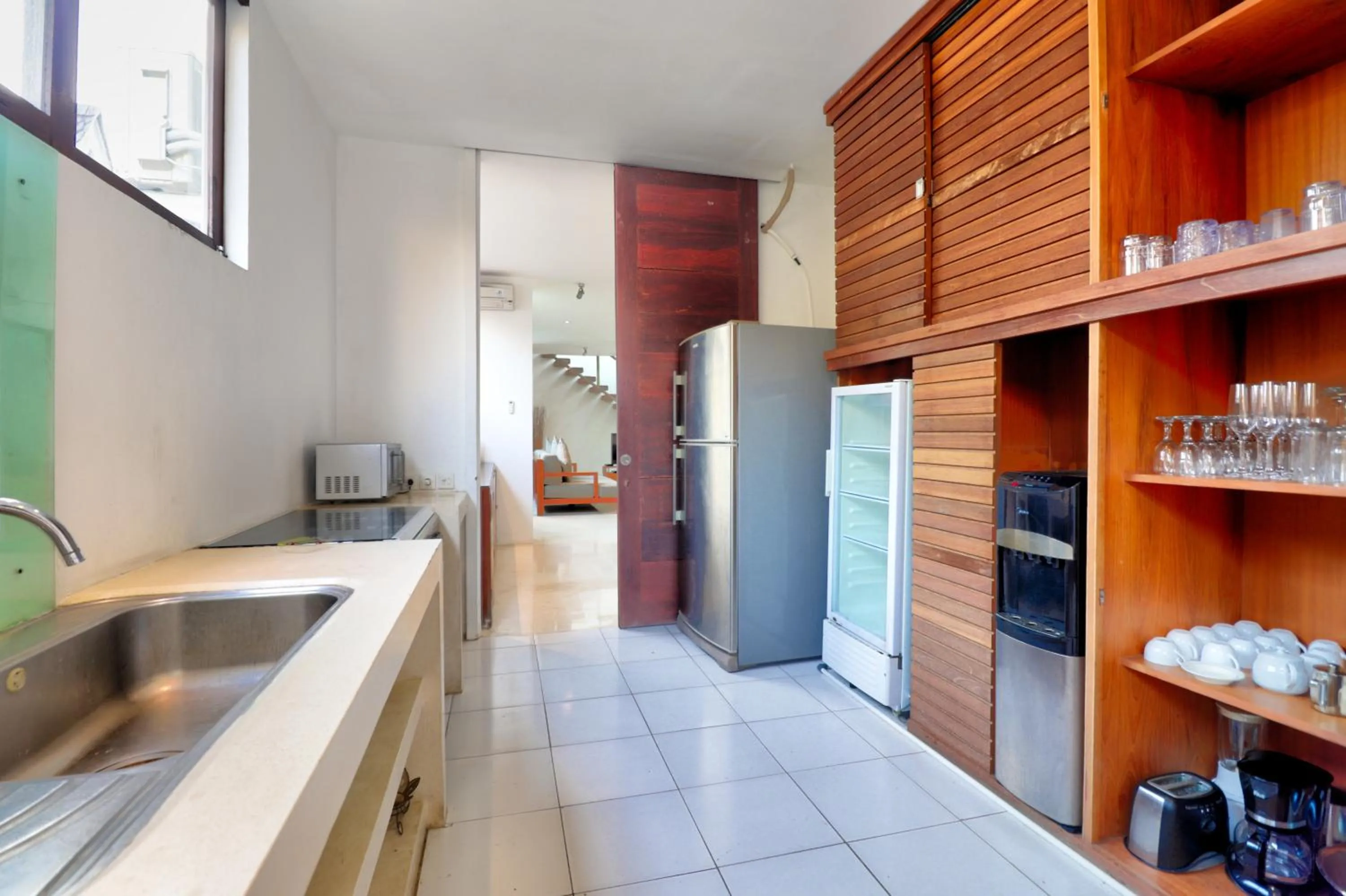 Kitchen or kitchenette in Beach Axis Villa, Seminyak