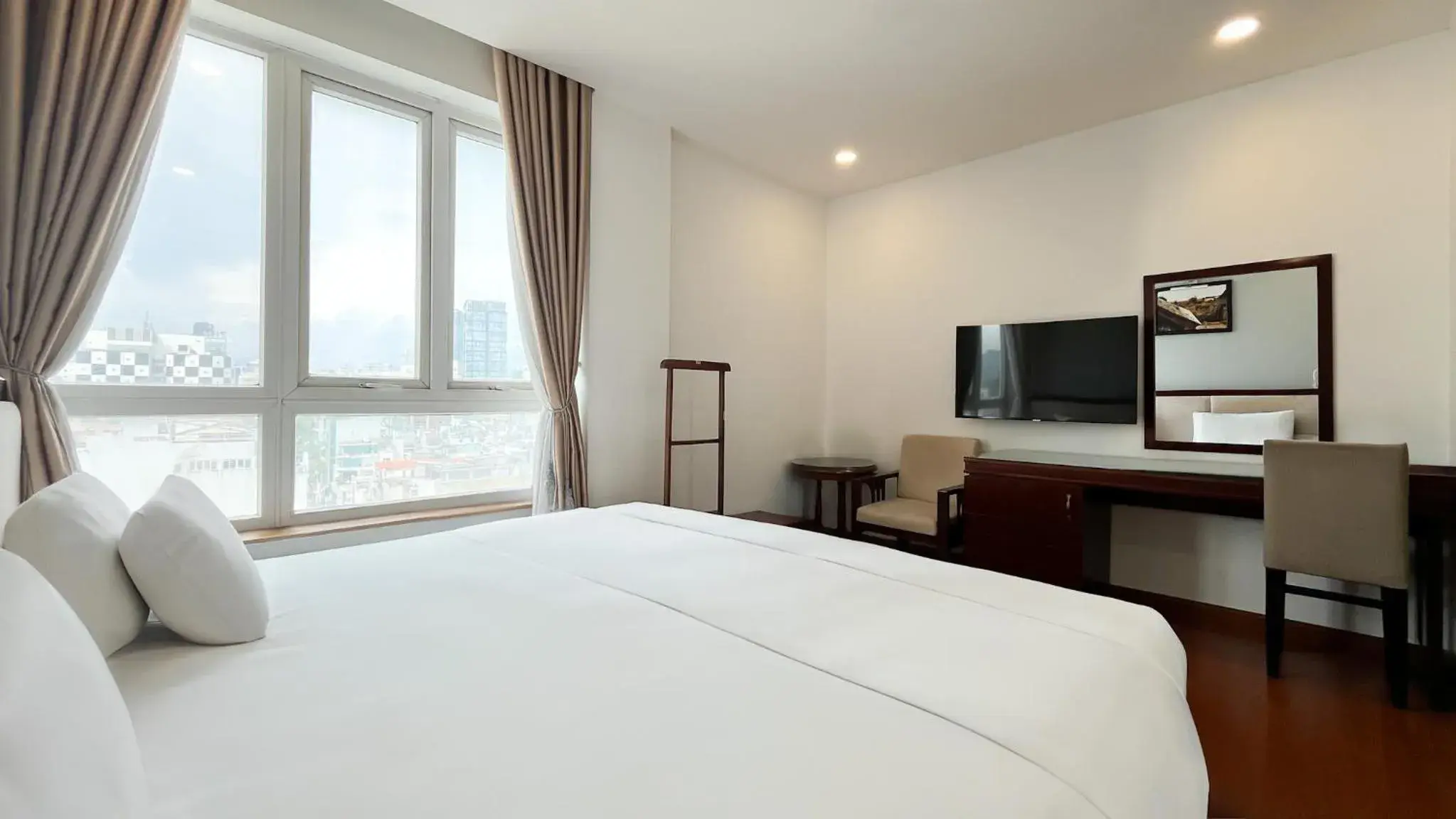 Communal lounge/ TV room, Bed in A25 Hotel - 180 Nguyễn Trãi Communal lounge/ TV room, Bed in A25 Hotel - 180 Nguyễn Trãi