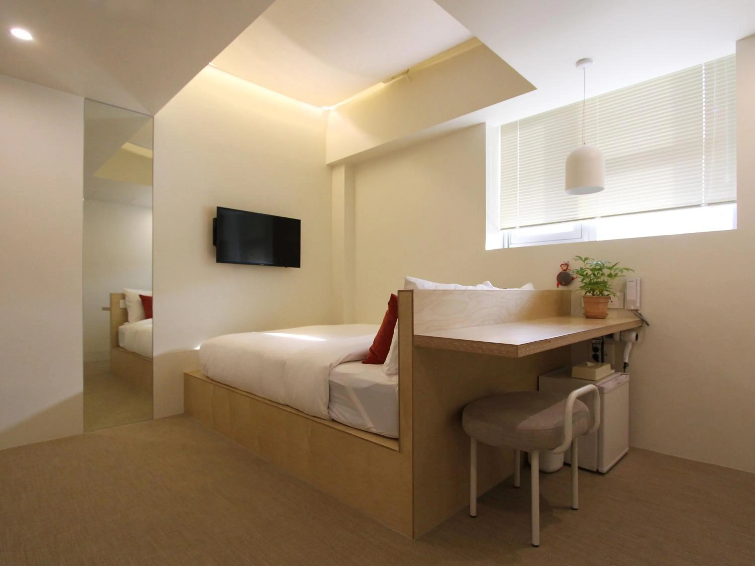 Bed in Tong Tong Petit Hotel