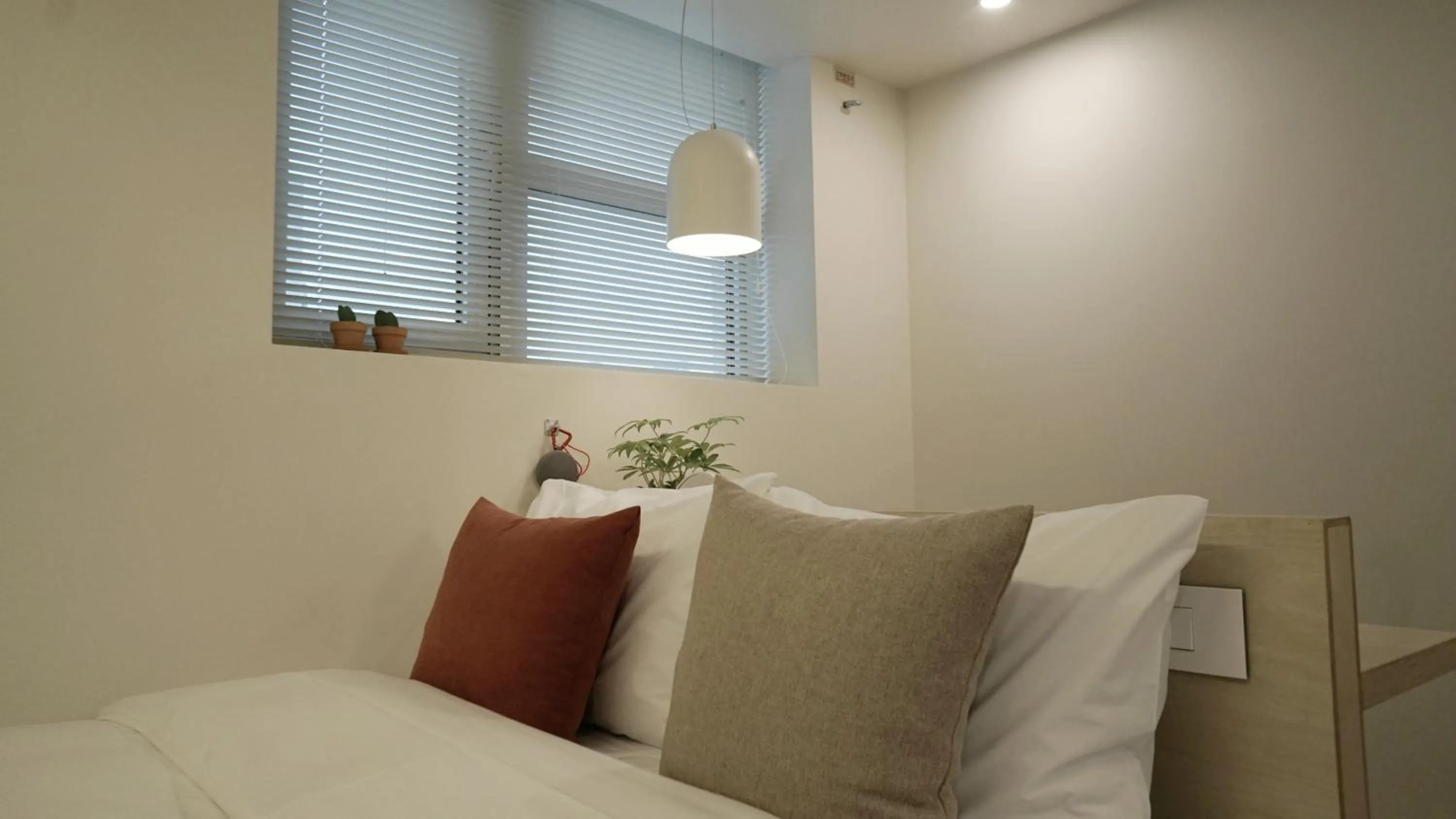 Bed in Tong Tong Petit Hotel