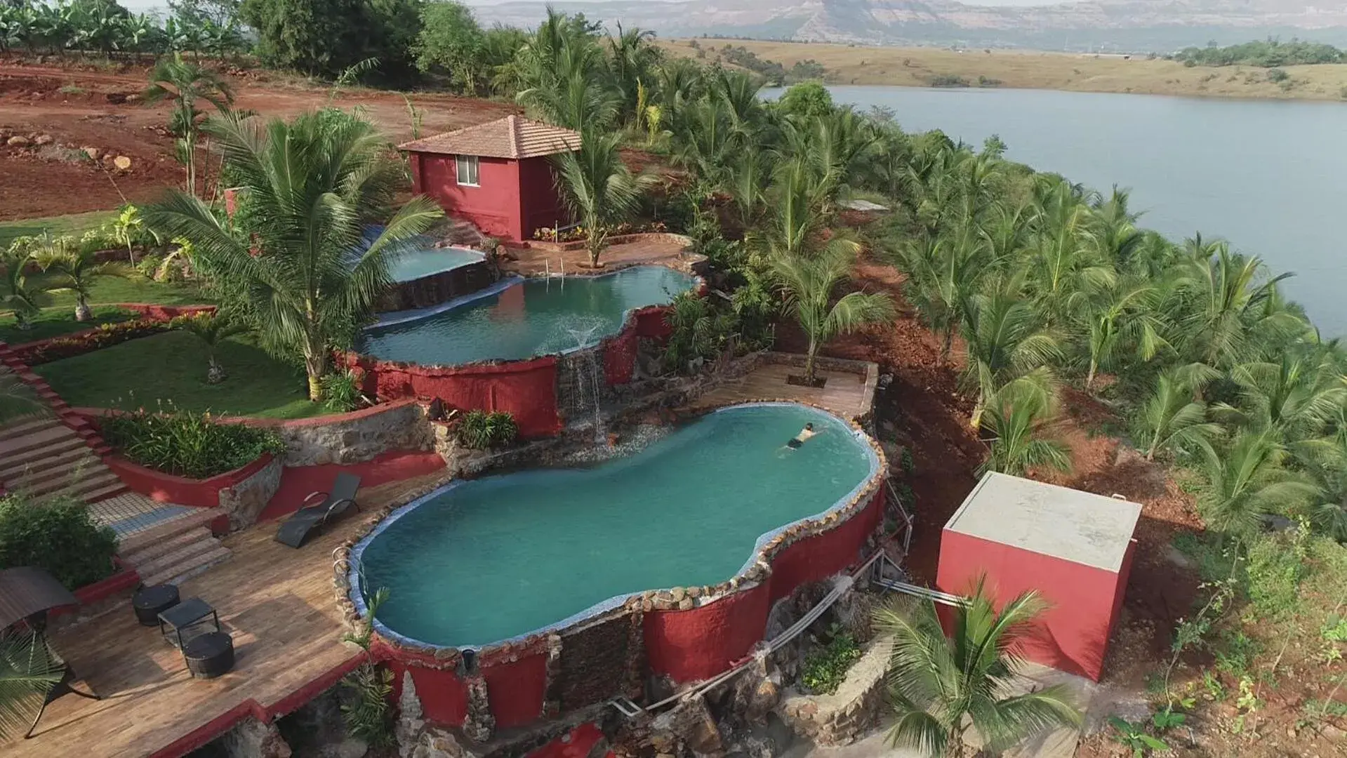 Swimming pool in Fazlani Natures Nest - The Wellness Retreat Swimming pool in Fazlani Natures Nest - The Wellness Retreat