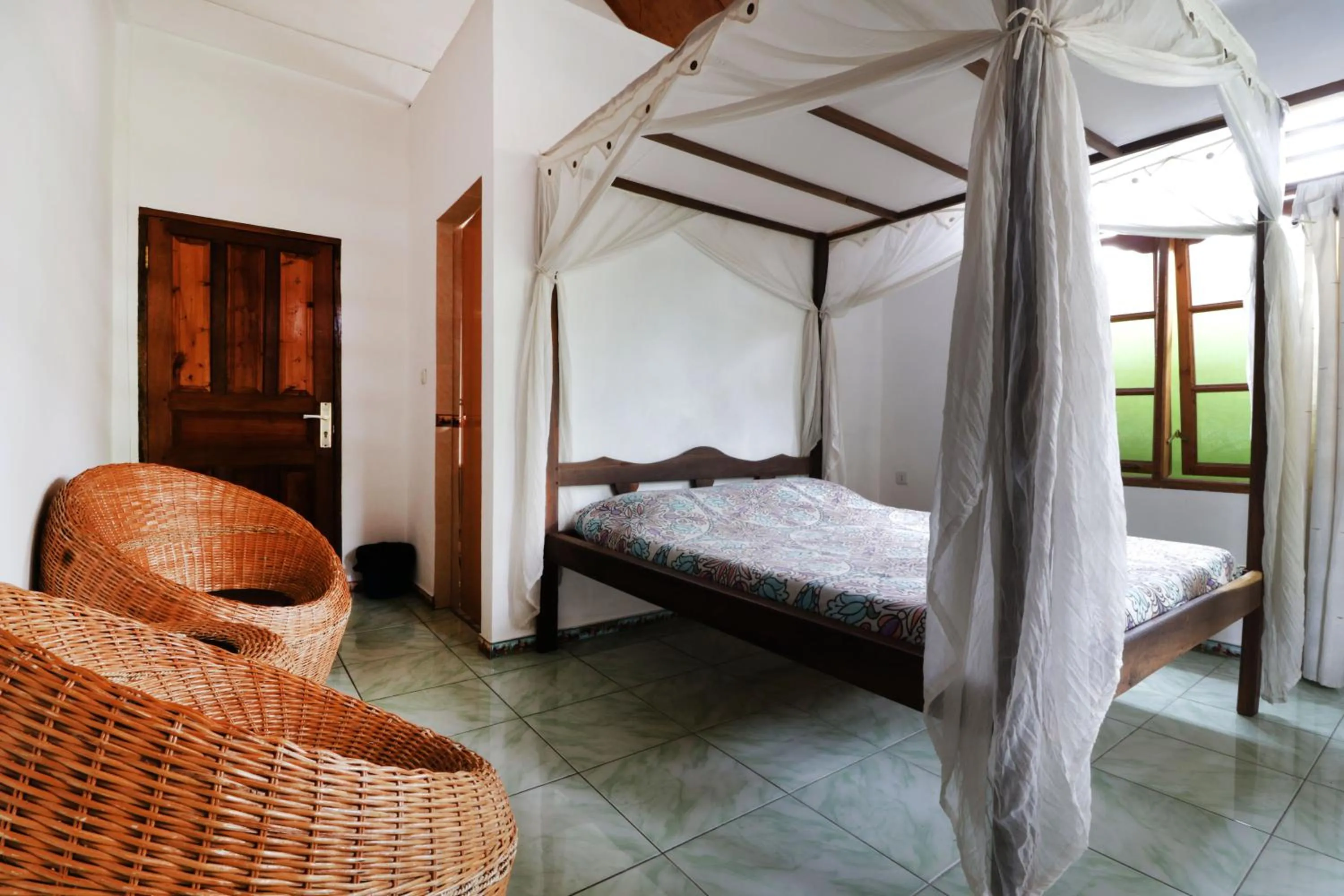Photo of the whole room, Bed in Bagus Bay Homestay