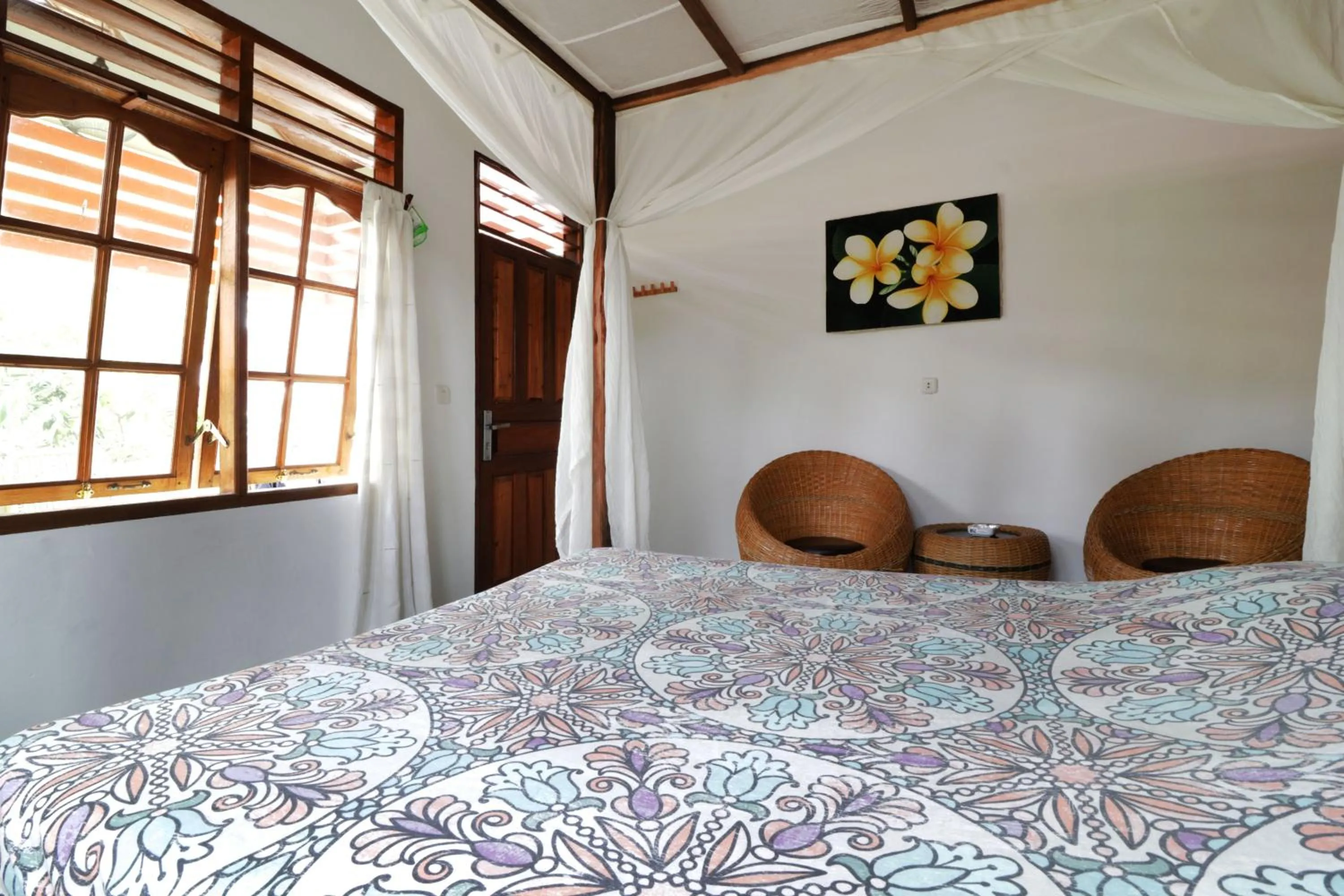Bed in Bagus Bay Homestay