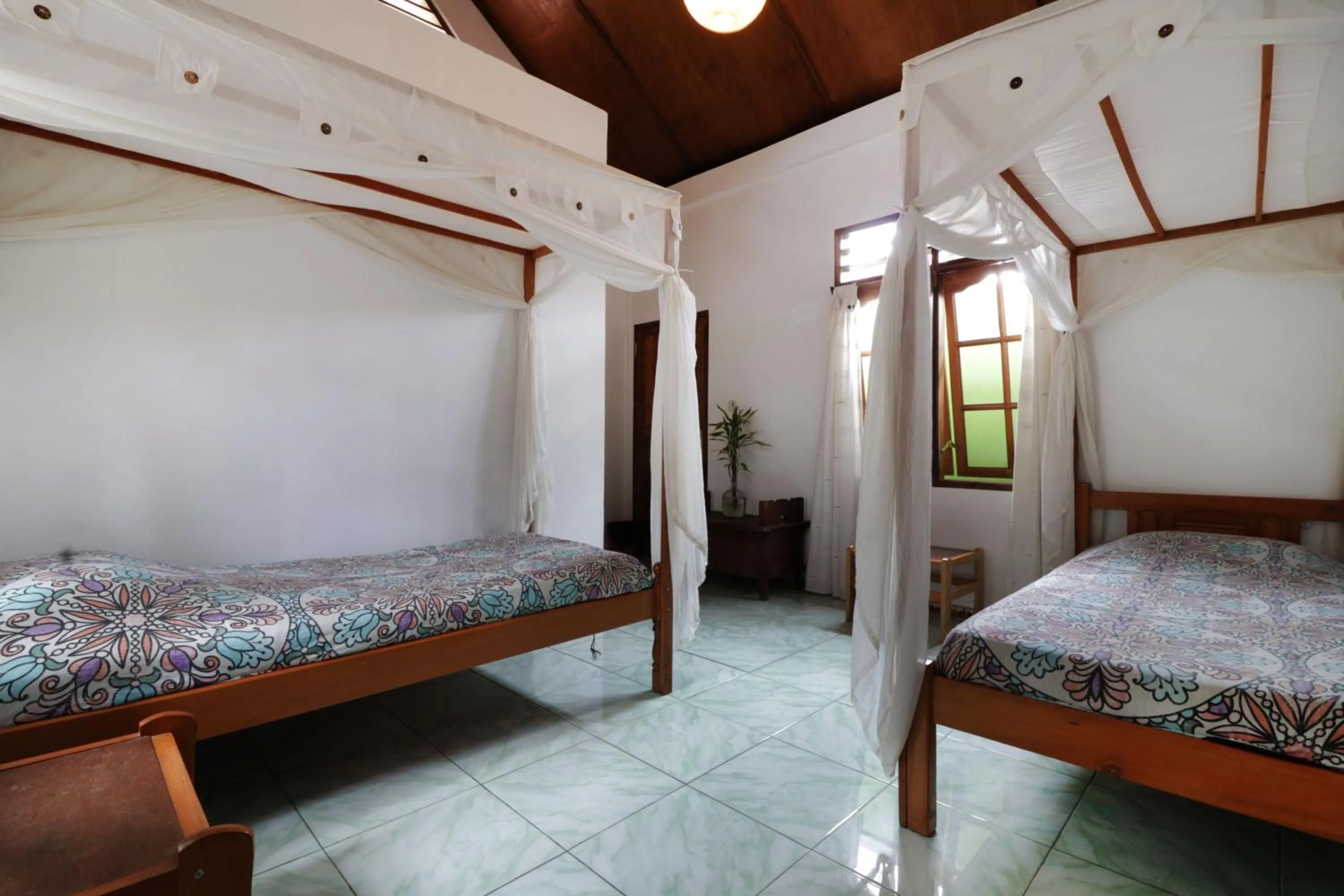 Photo of the whole room, Bed in Bagus Bay Homestay