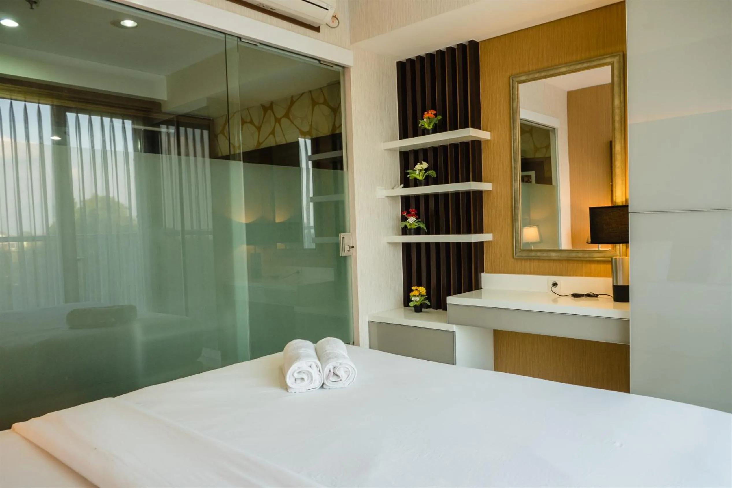 Luxurious 1BR At Dago Suites Apartment By Travelio