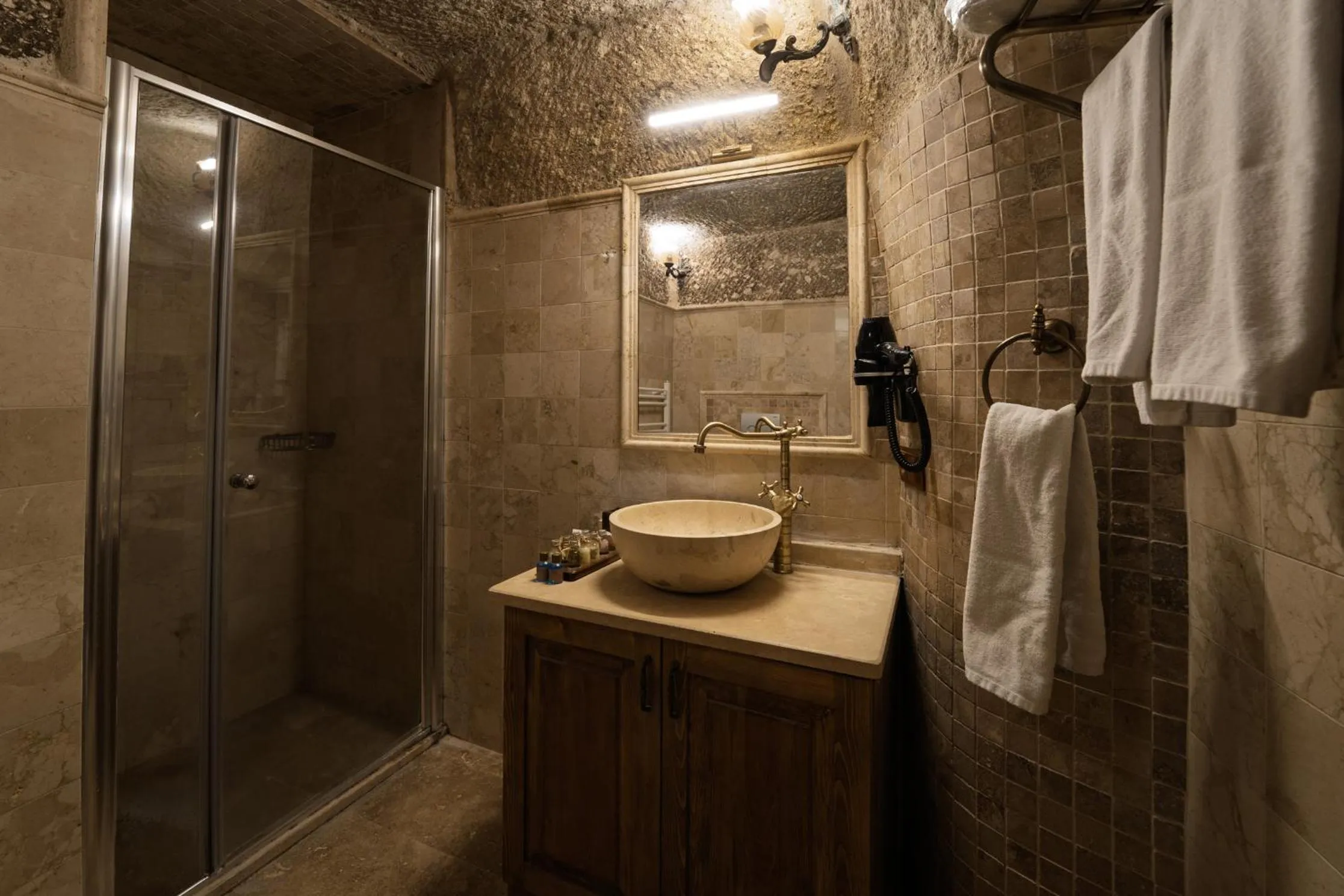 Shower in Grand Cave Suites