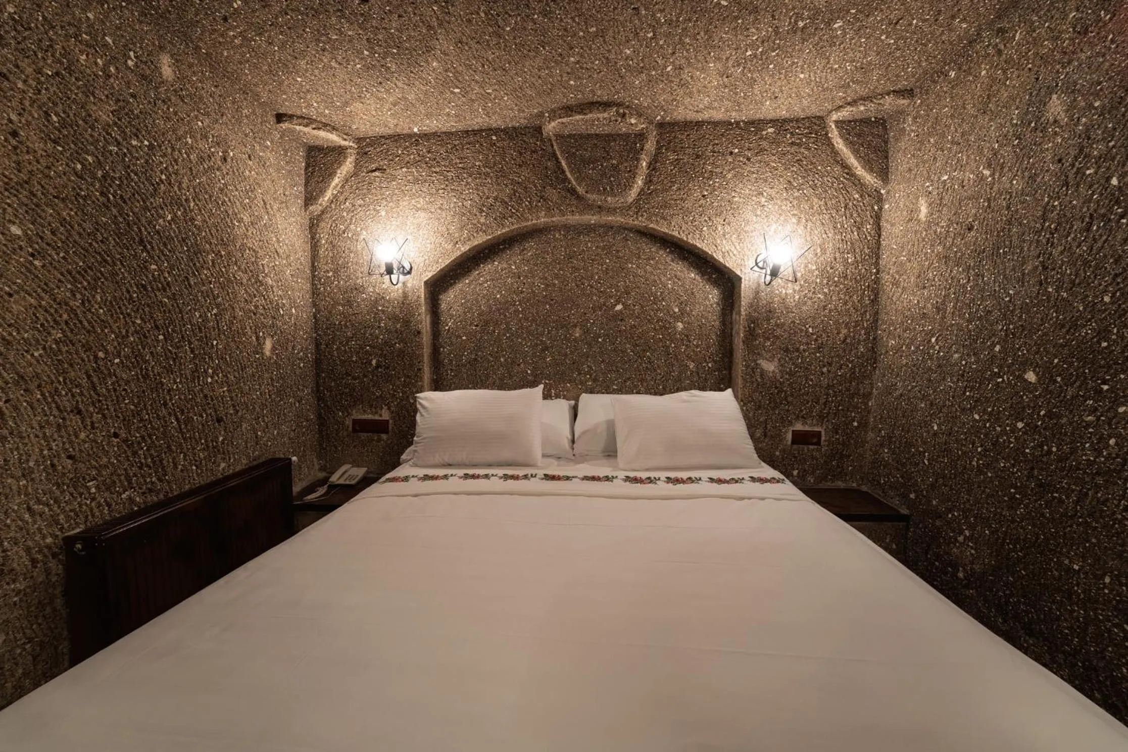 Bed in Grand Cave Suites