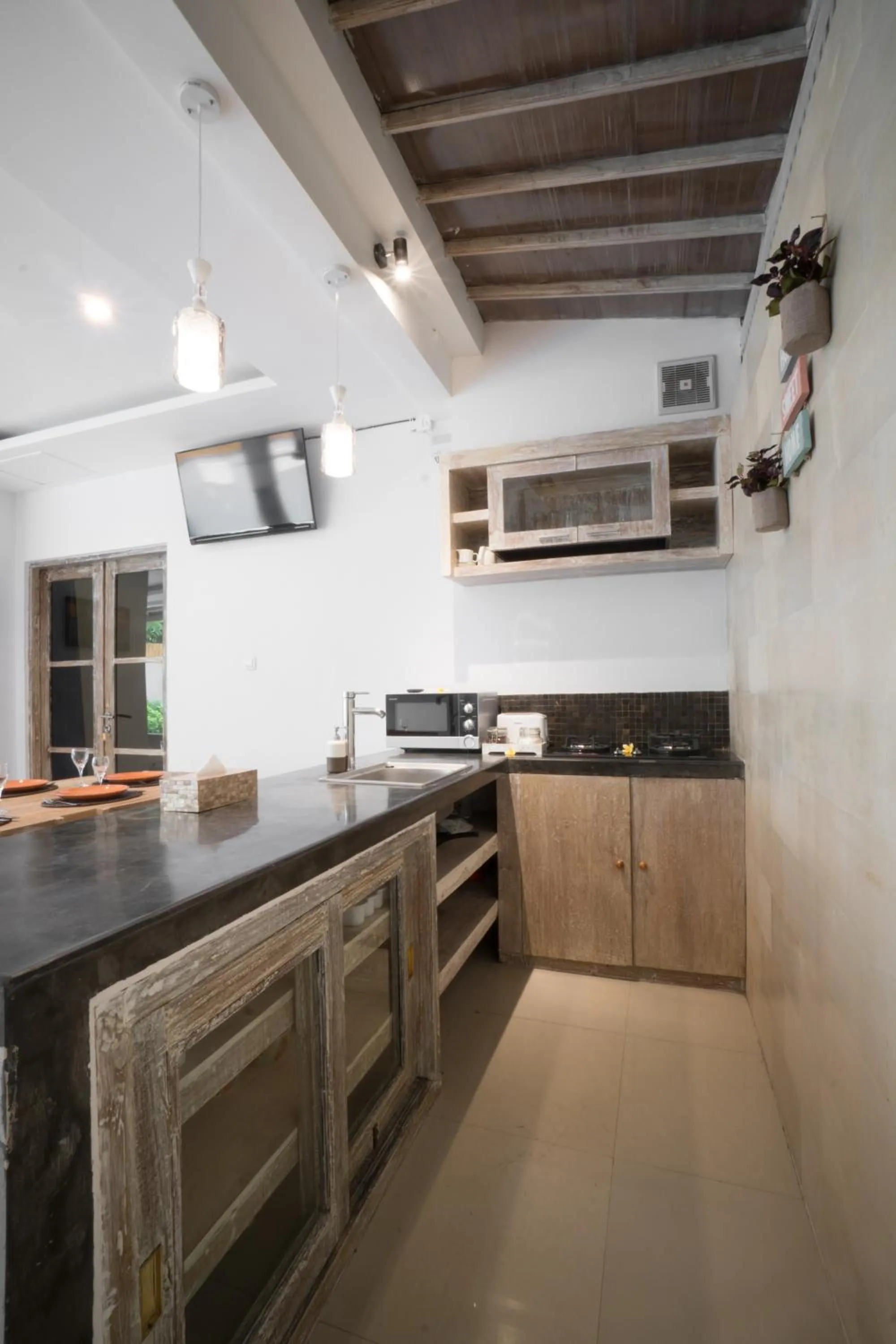 Communal kitchen in The Catur Villa Seminyak