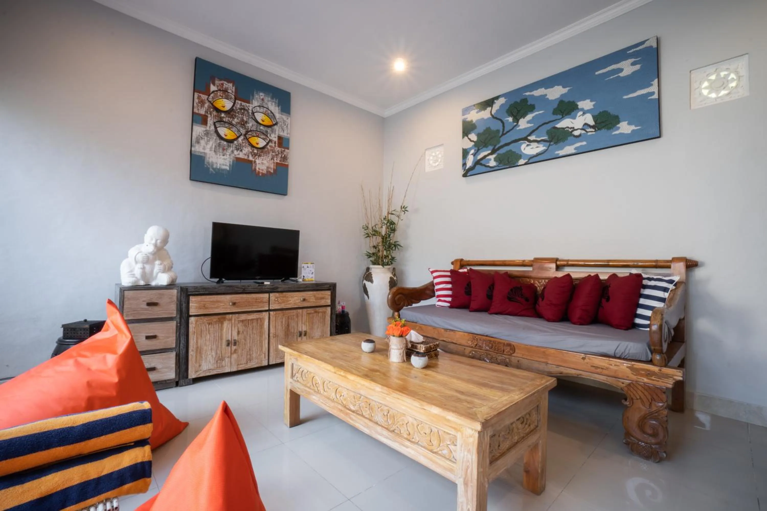 Communal lounge/ TV room in The Catur Villa Seminyak