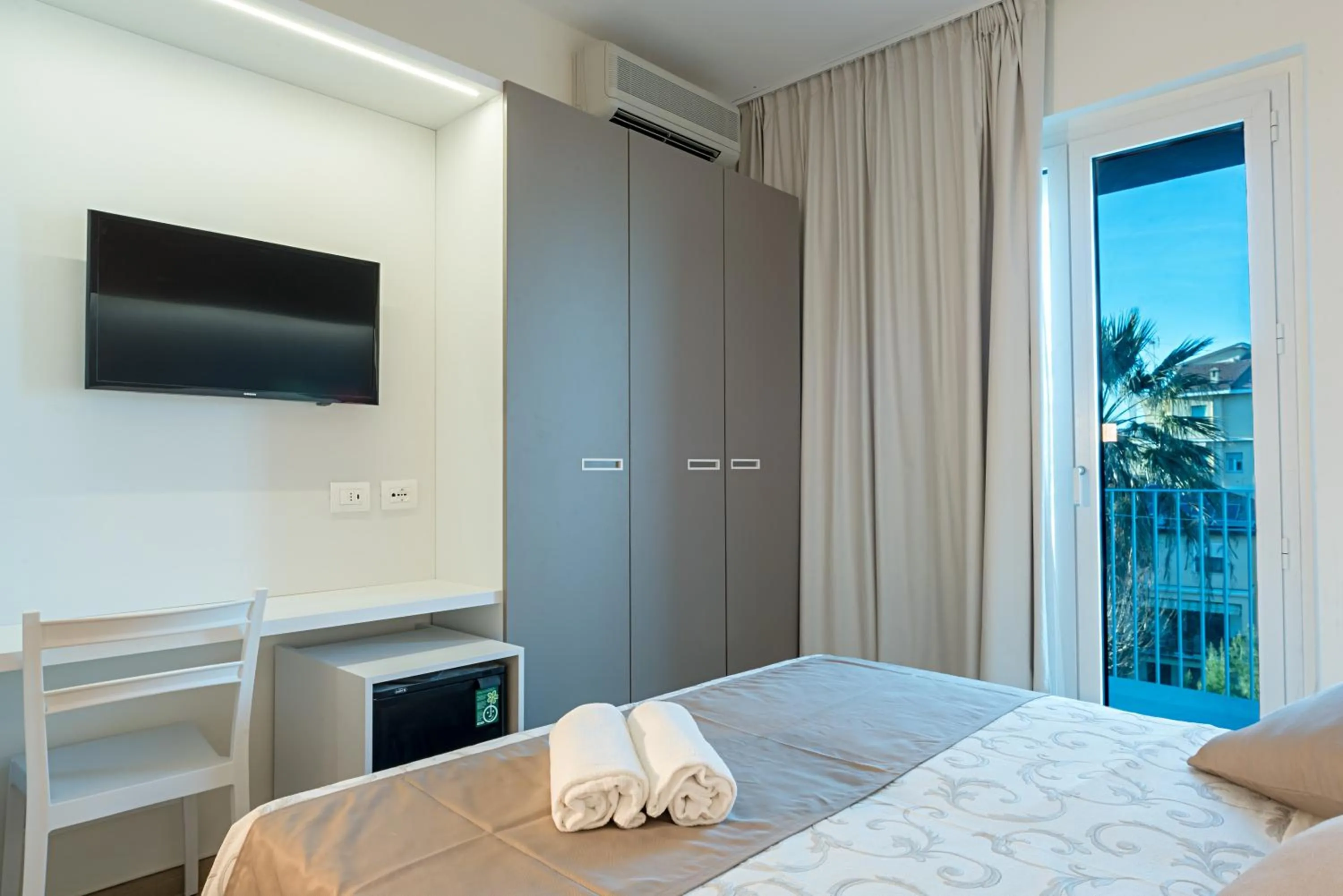 Bed in Family Hotel Relax