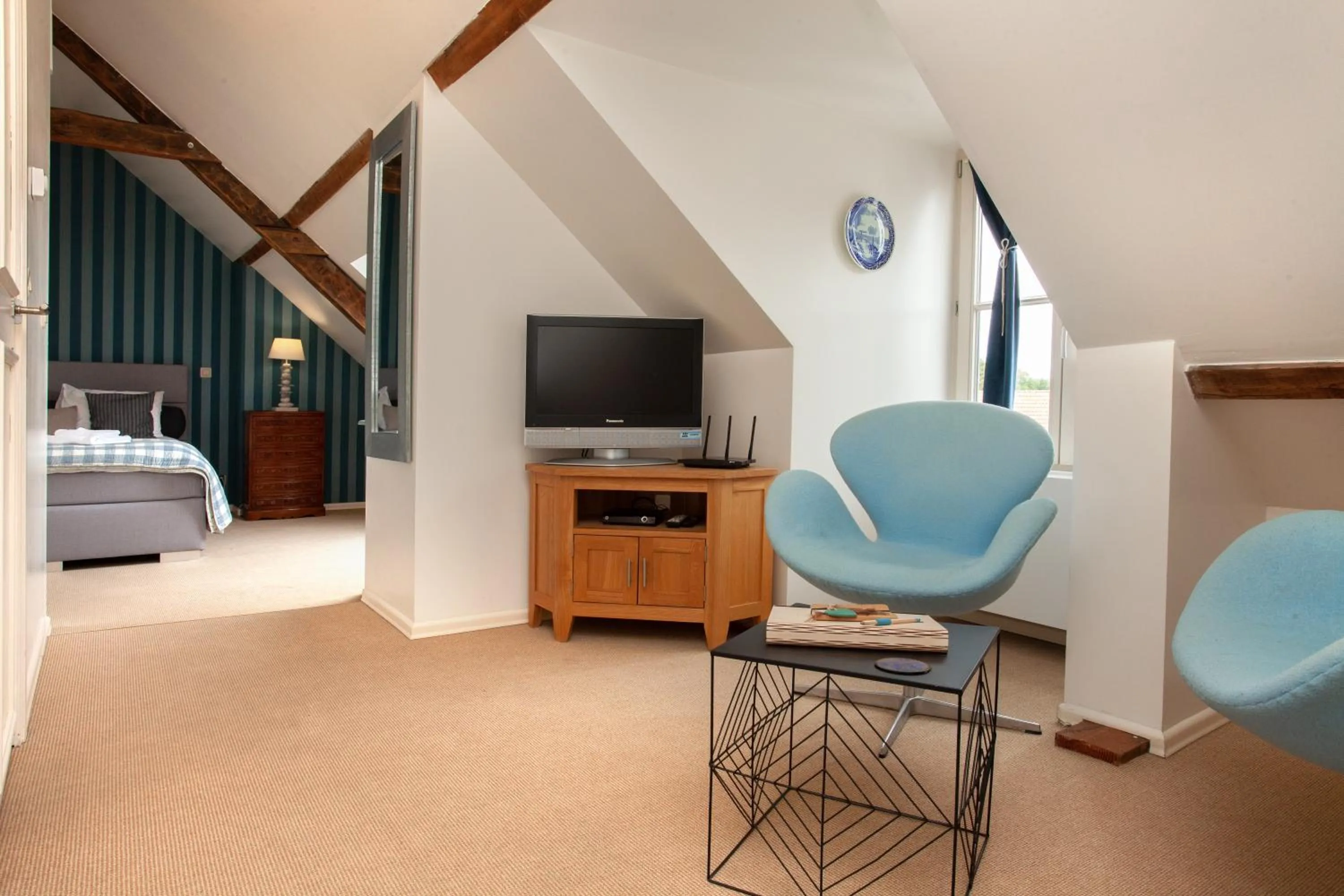 Seating area, Bed in Boutique B&B The Townhouse