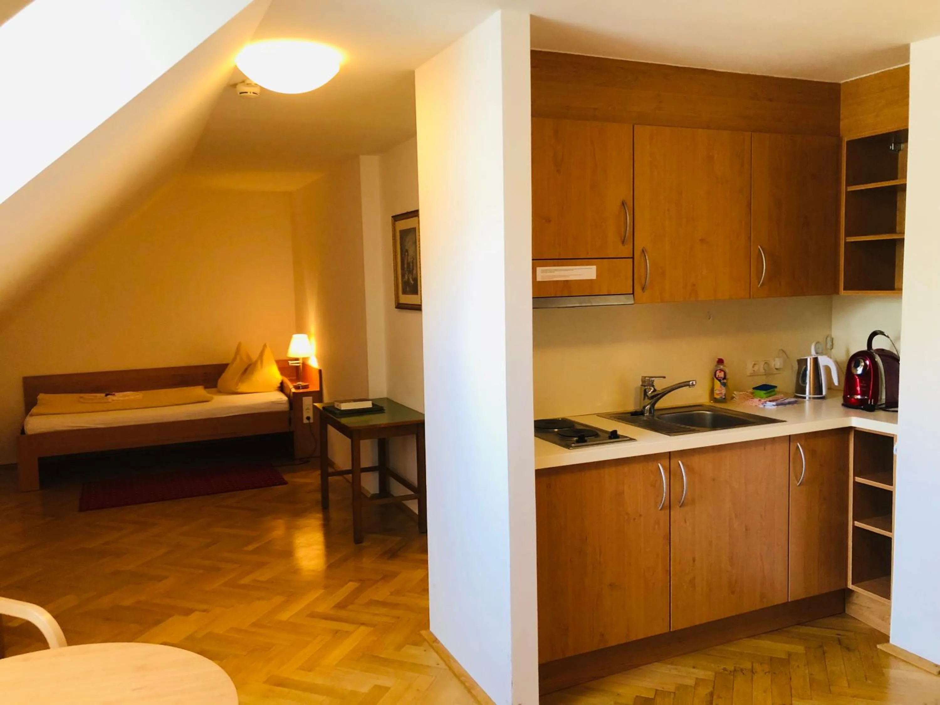 Photo of the whole room, Bed in Gästehaus im Priesterseminar Salzburg