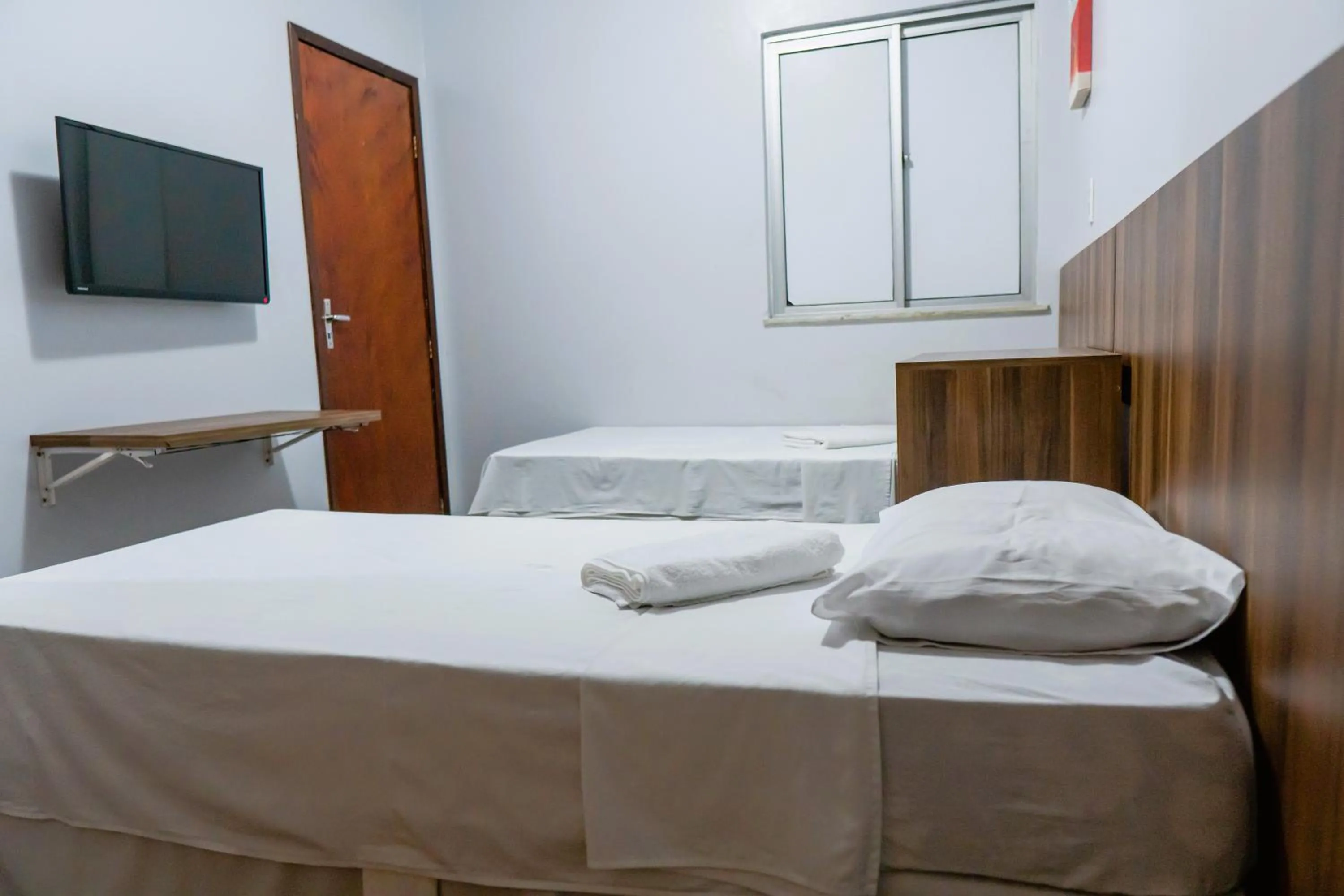 Bed in Pousada das Maracanãs
