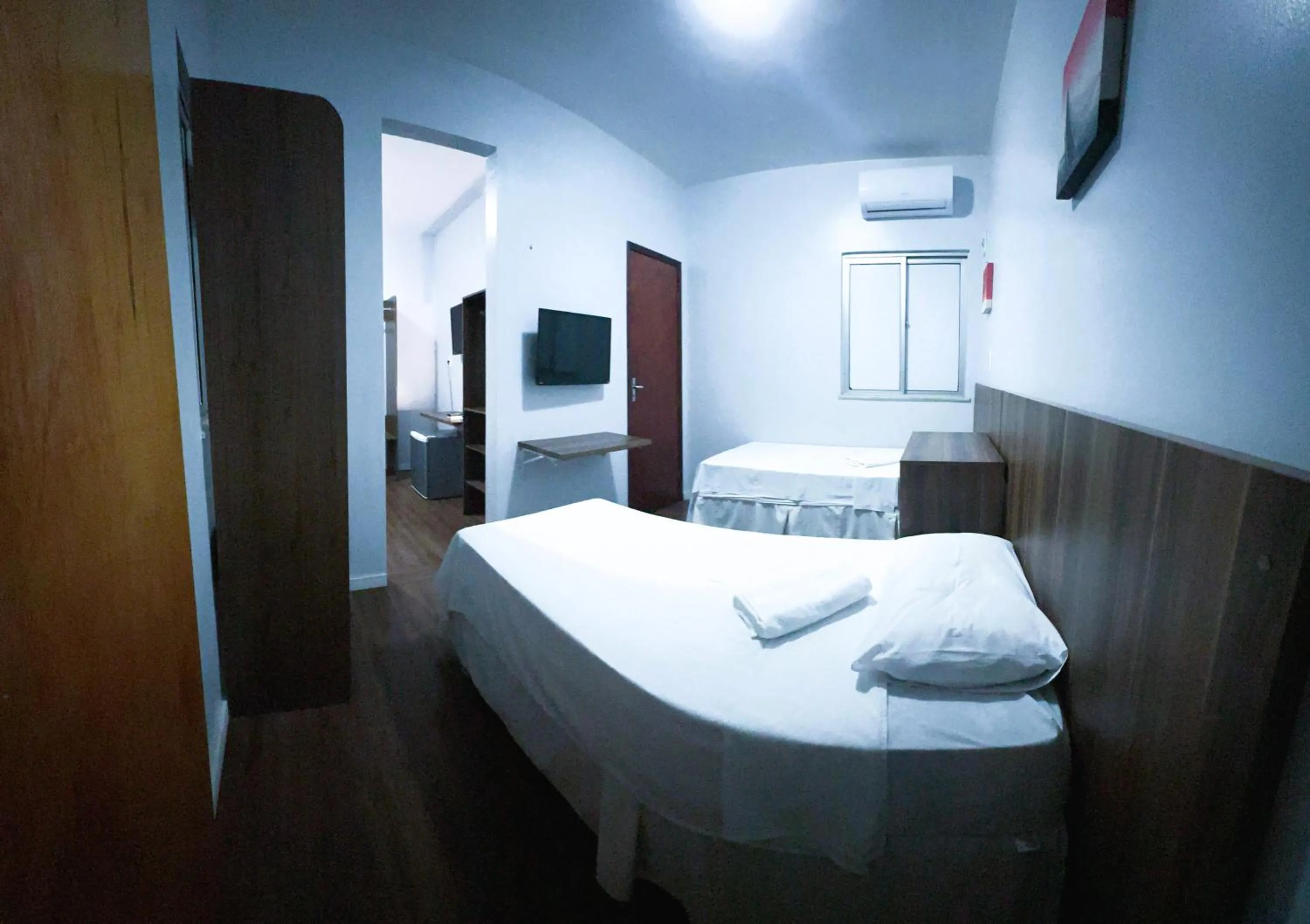 Bed in Pousada das Maracanãs