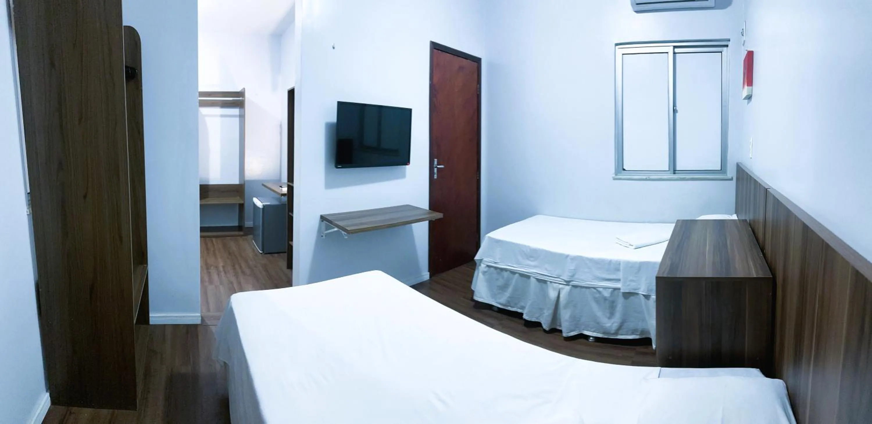 Bed in Pousada das Maracanãs