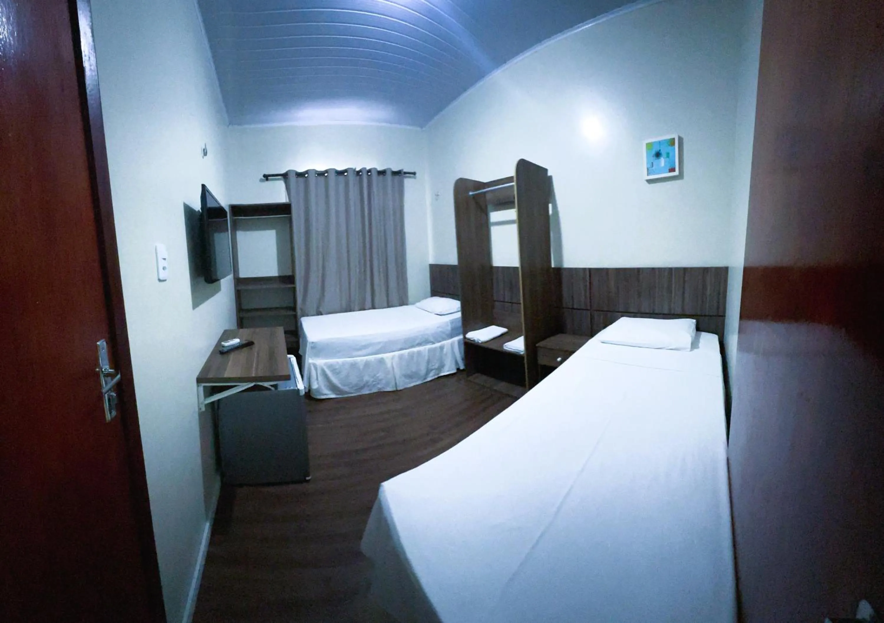 Bed in Pousada das Maracanãs