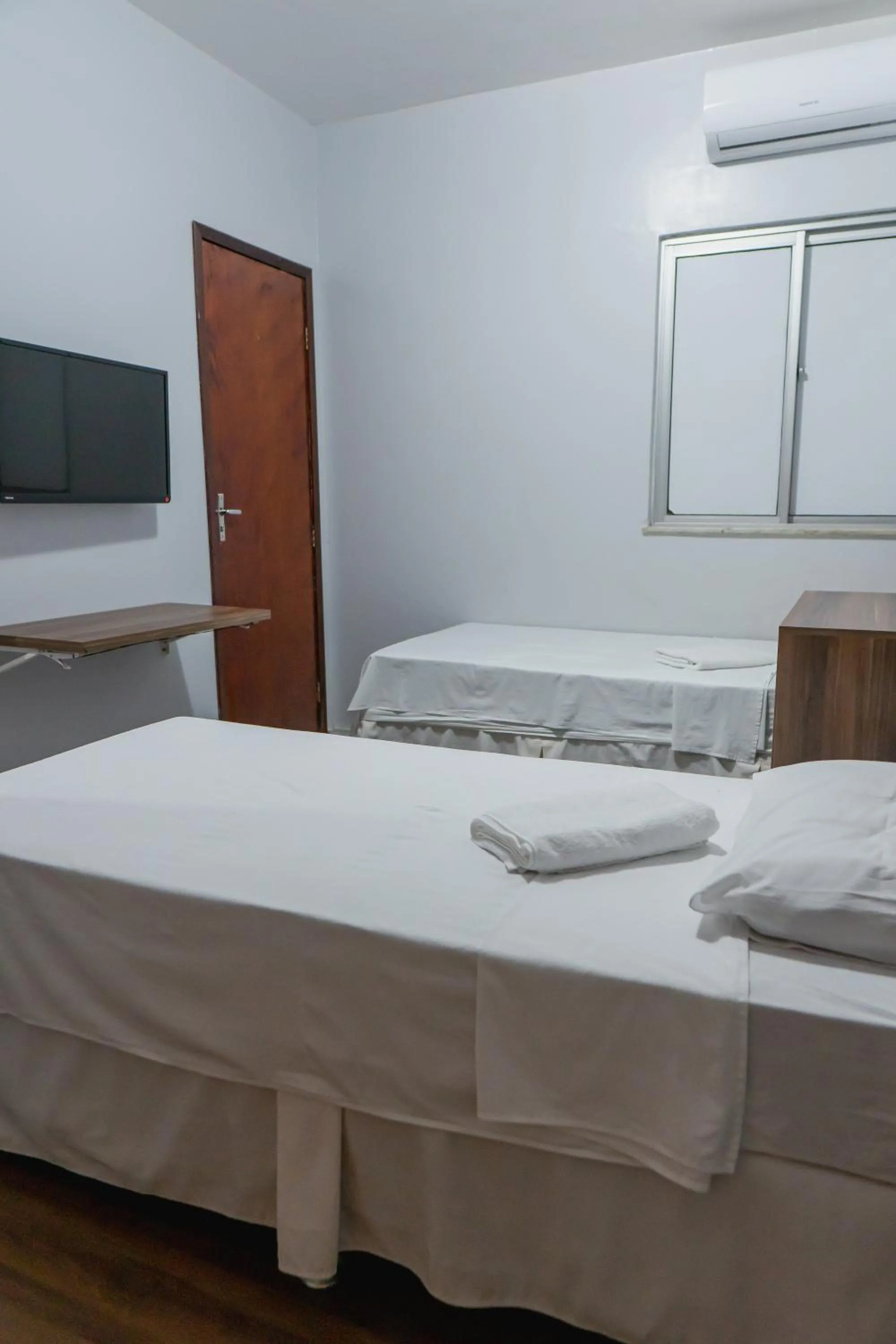 Bed in Pousada das Maracanãs