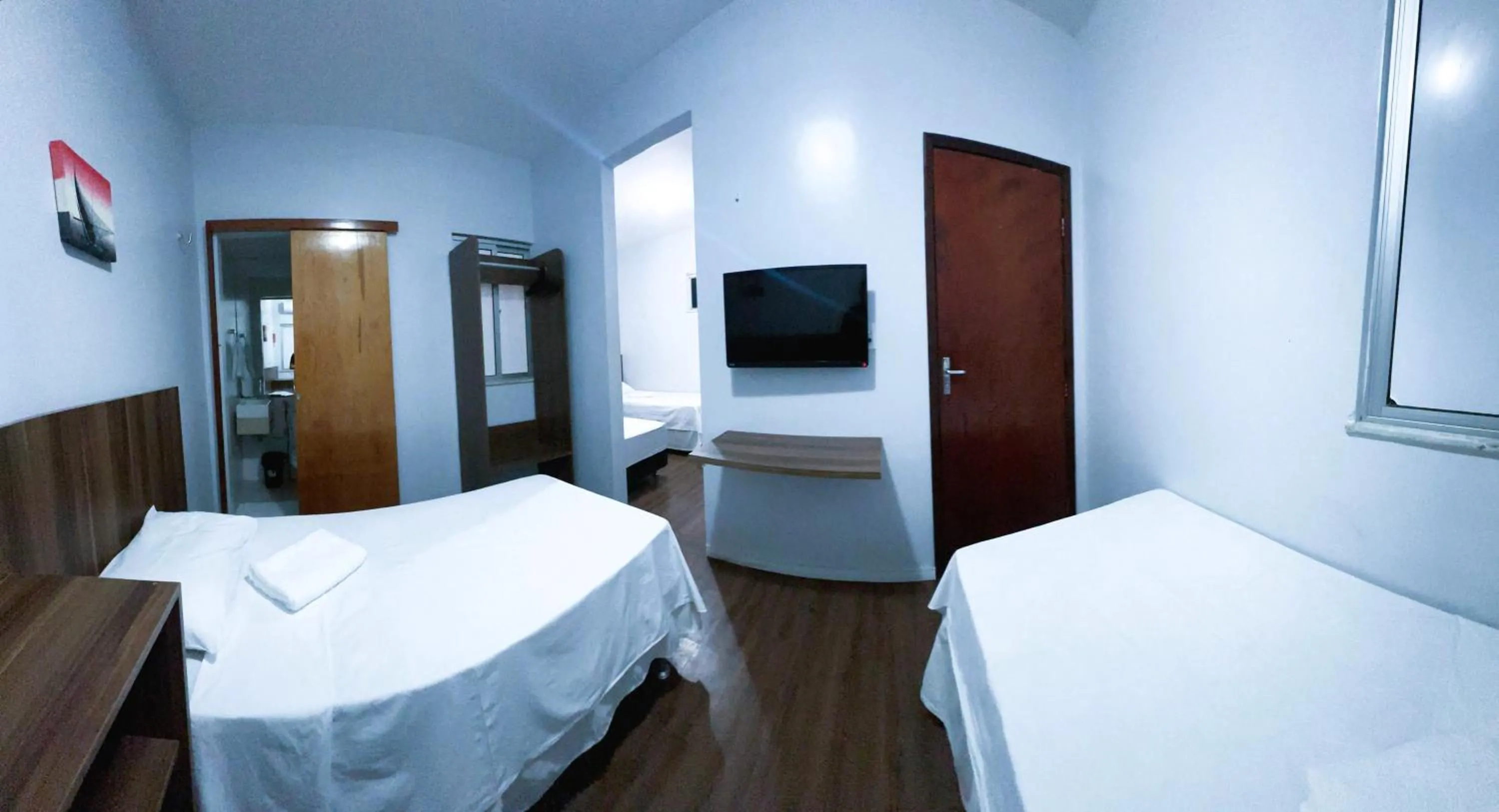 Bed in Pousada das Maracanãs