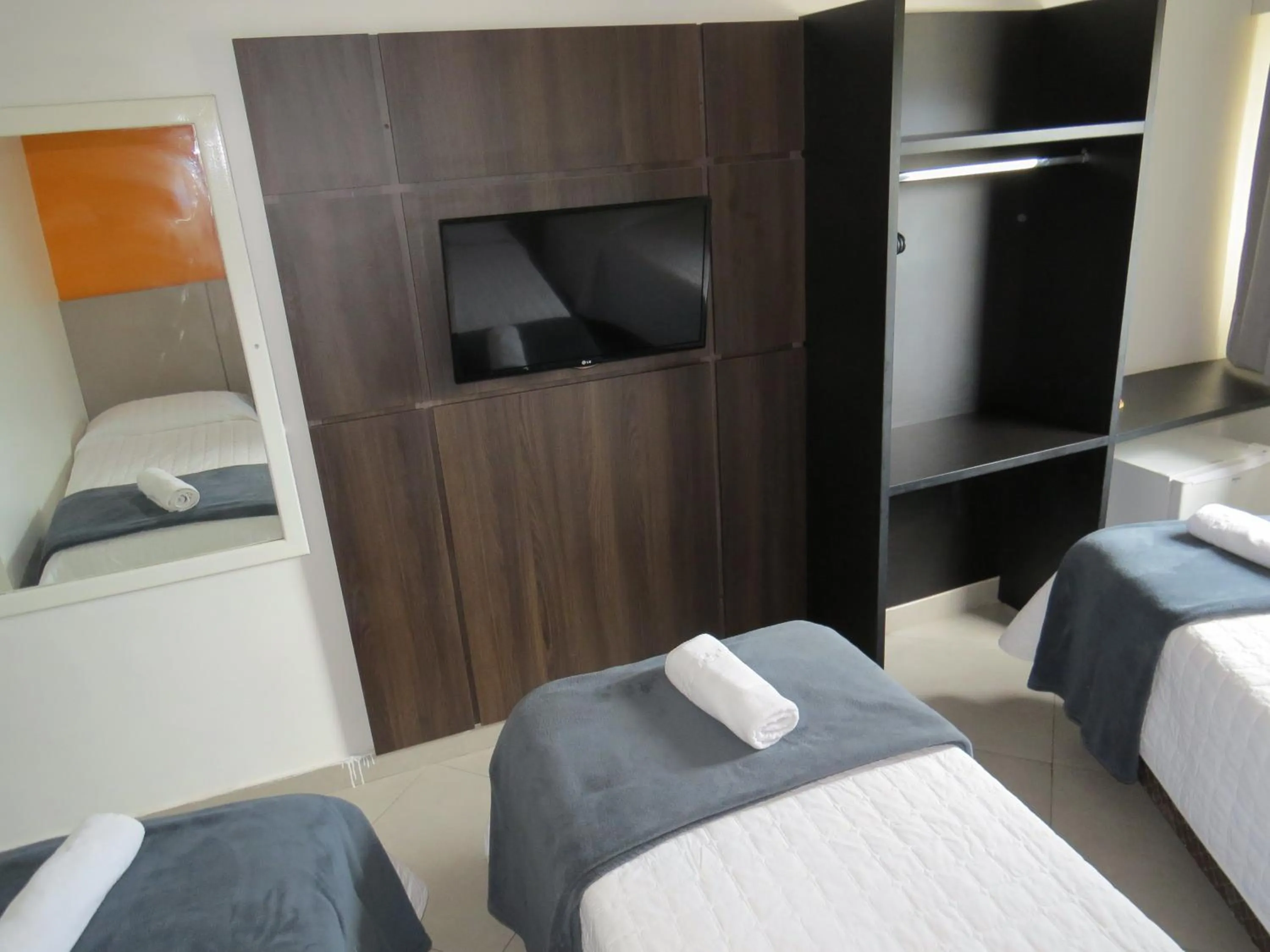 Bedroom, Bed in Minuano Hotel Express próx Orla Lago Guaíba, Mercado Público, 300 m Rodoviária