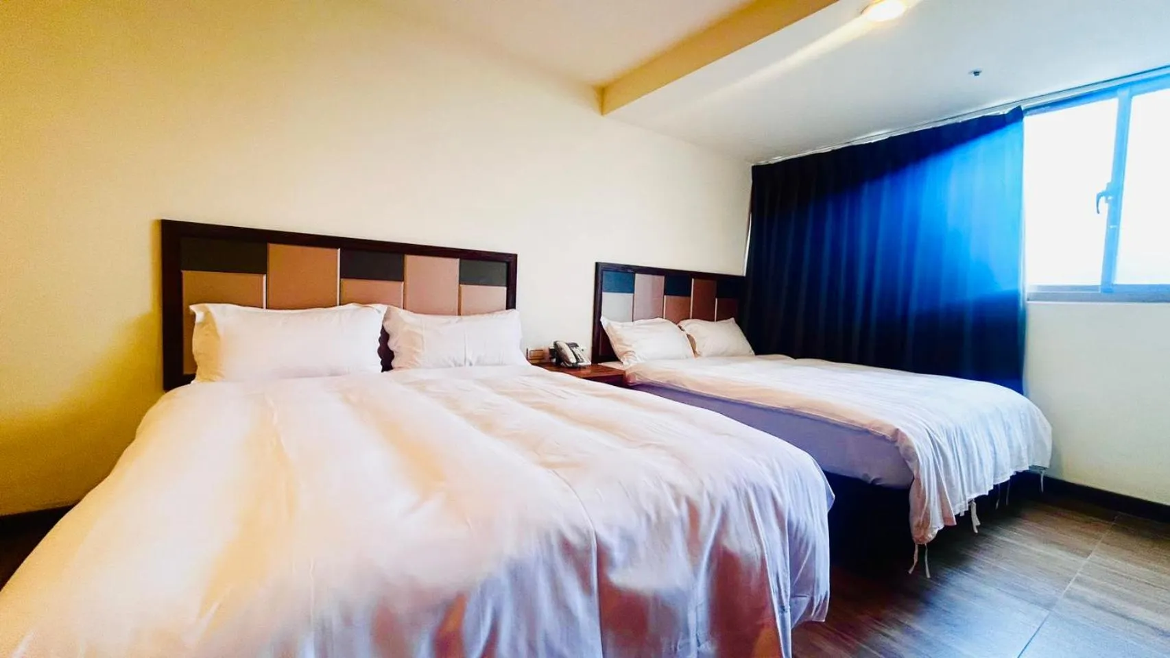 Bed in Greeninn Hotel