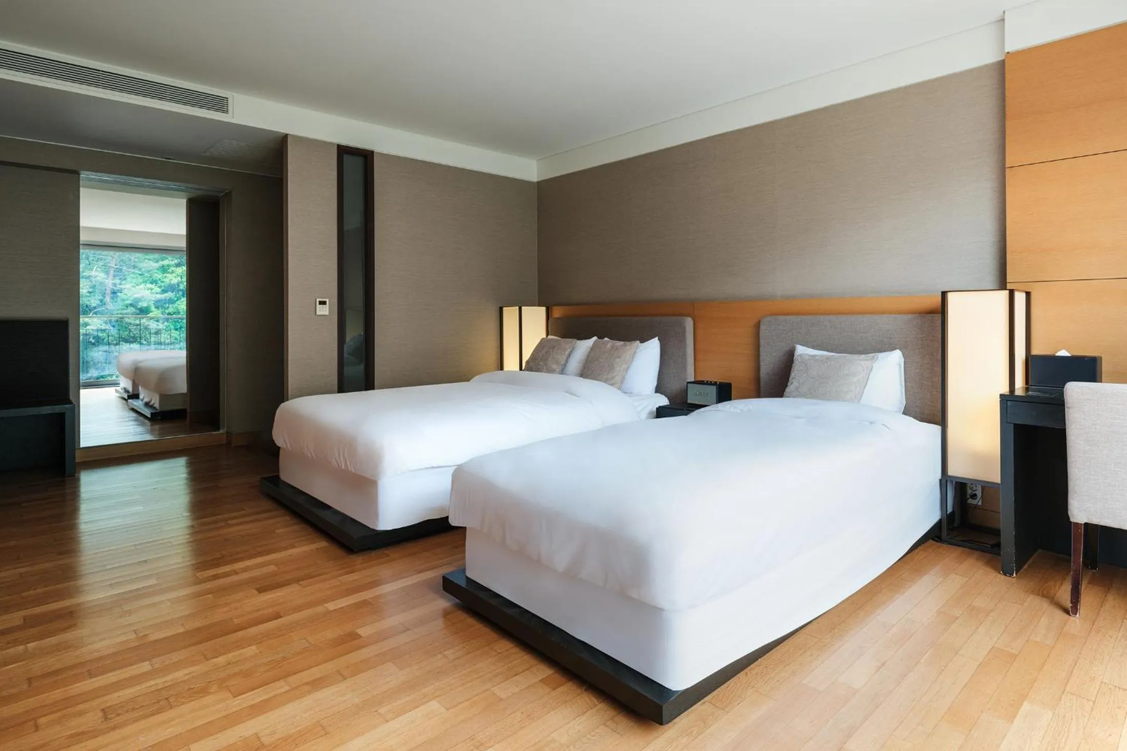 Bed in The Suites Hotel Namwon