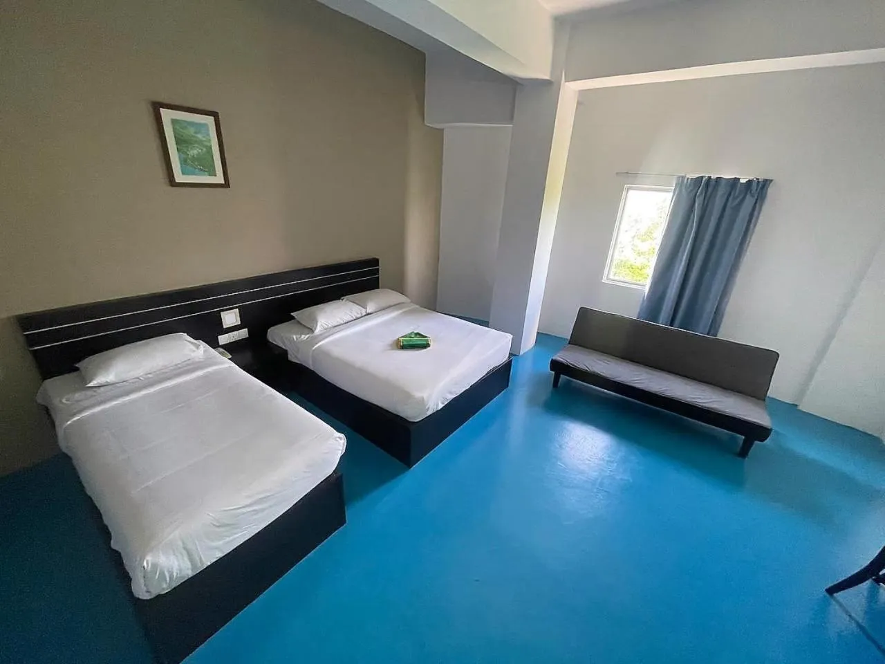 Bed in Kuala Melaka Inn