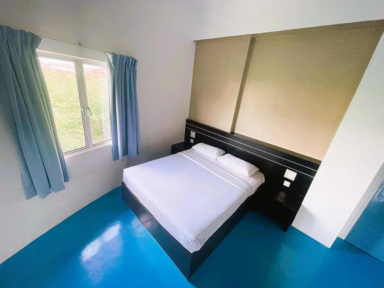 Bed in Kuala Melaka Inn