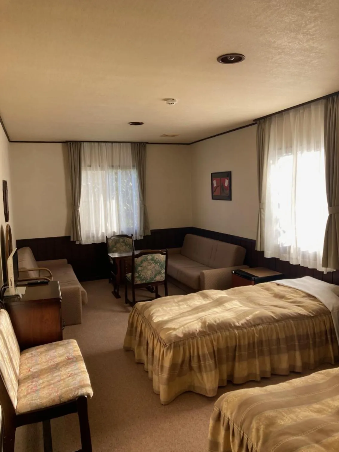 Photo of the whole room, Bed in Pension Totem Pole