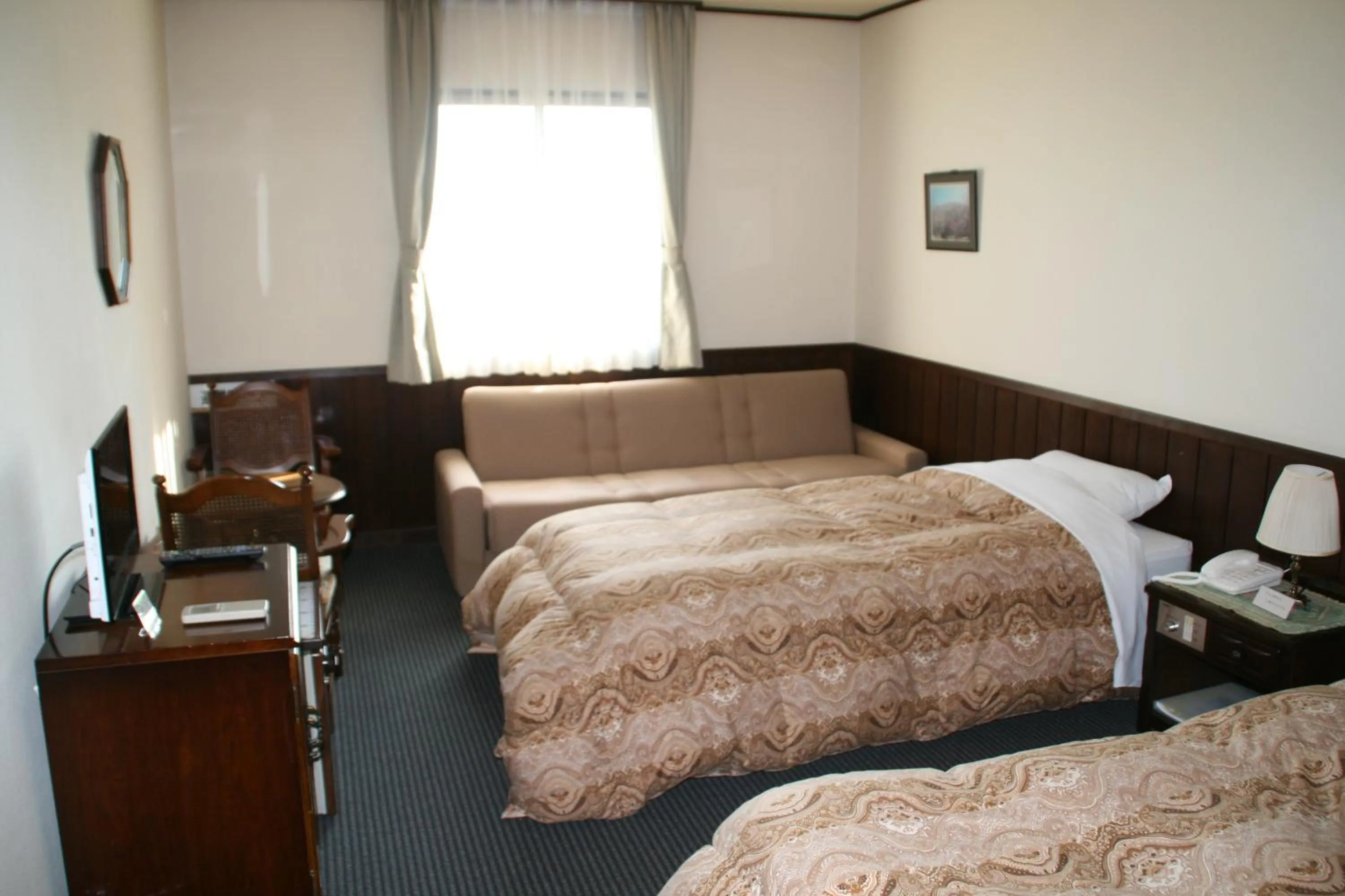 Bed in Pension Totem Pole