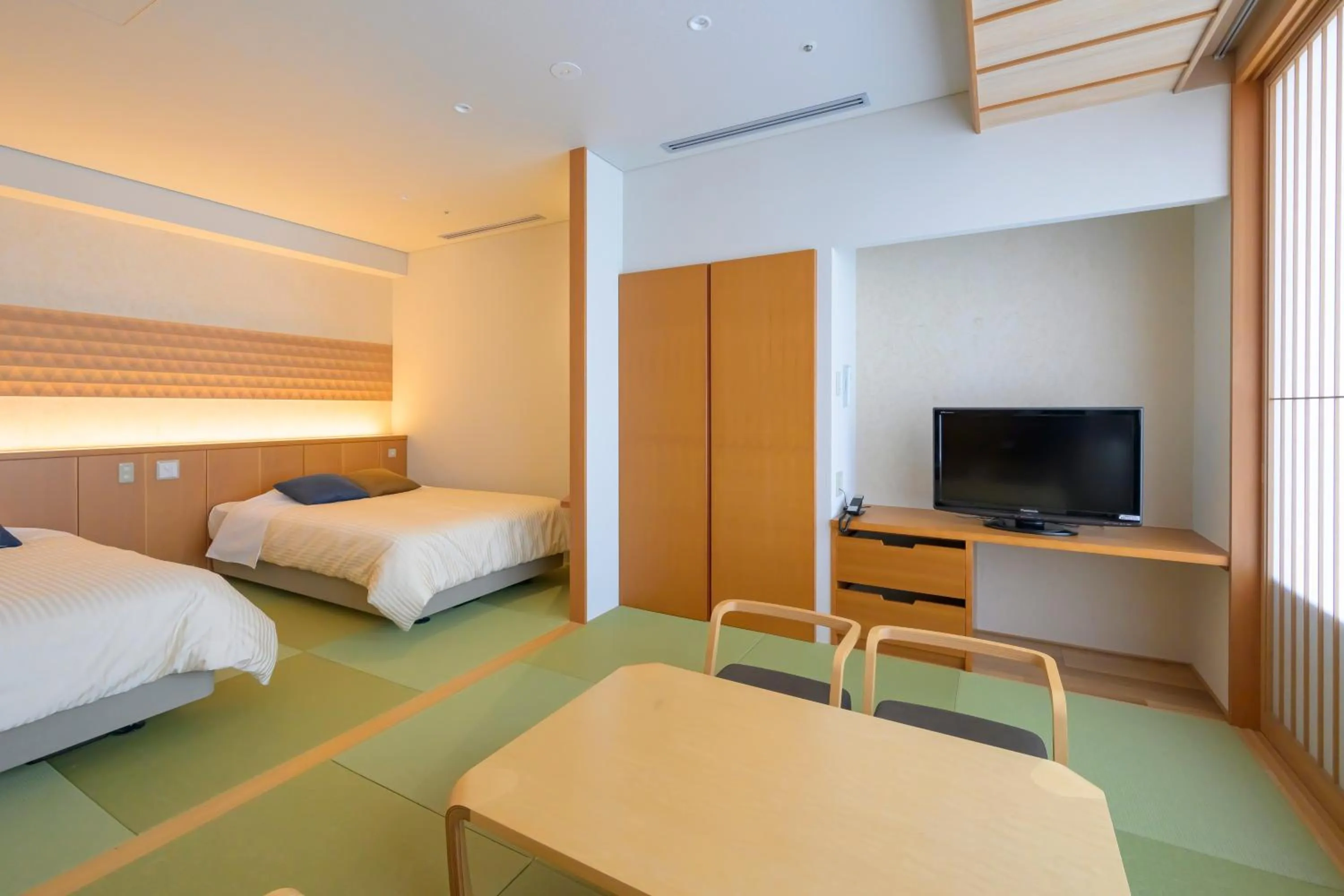 Bed in Tendo Hotel