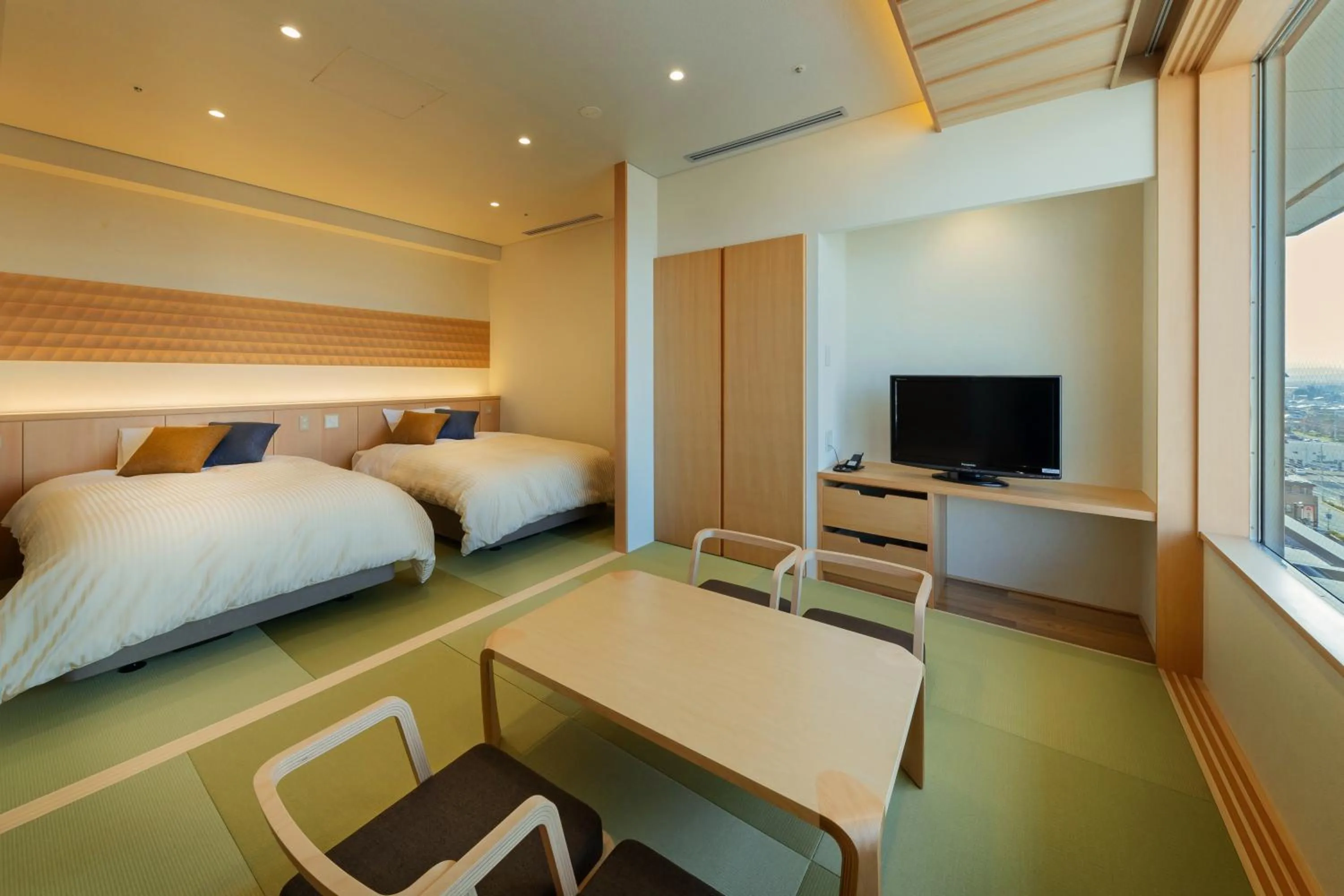 Photo of the whole room, Bed in Tendo Hotel