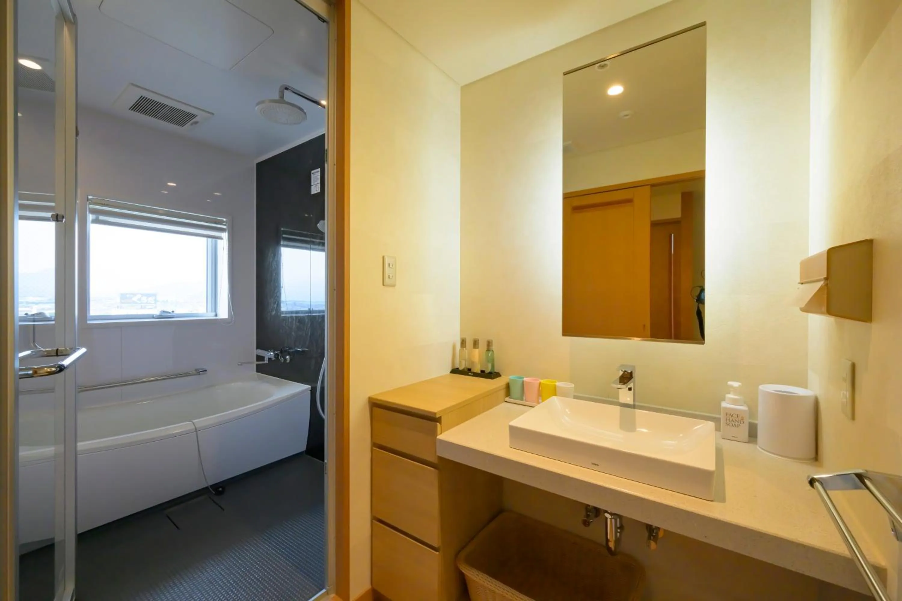 Bathroom, Bed in Tendo Hotel