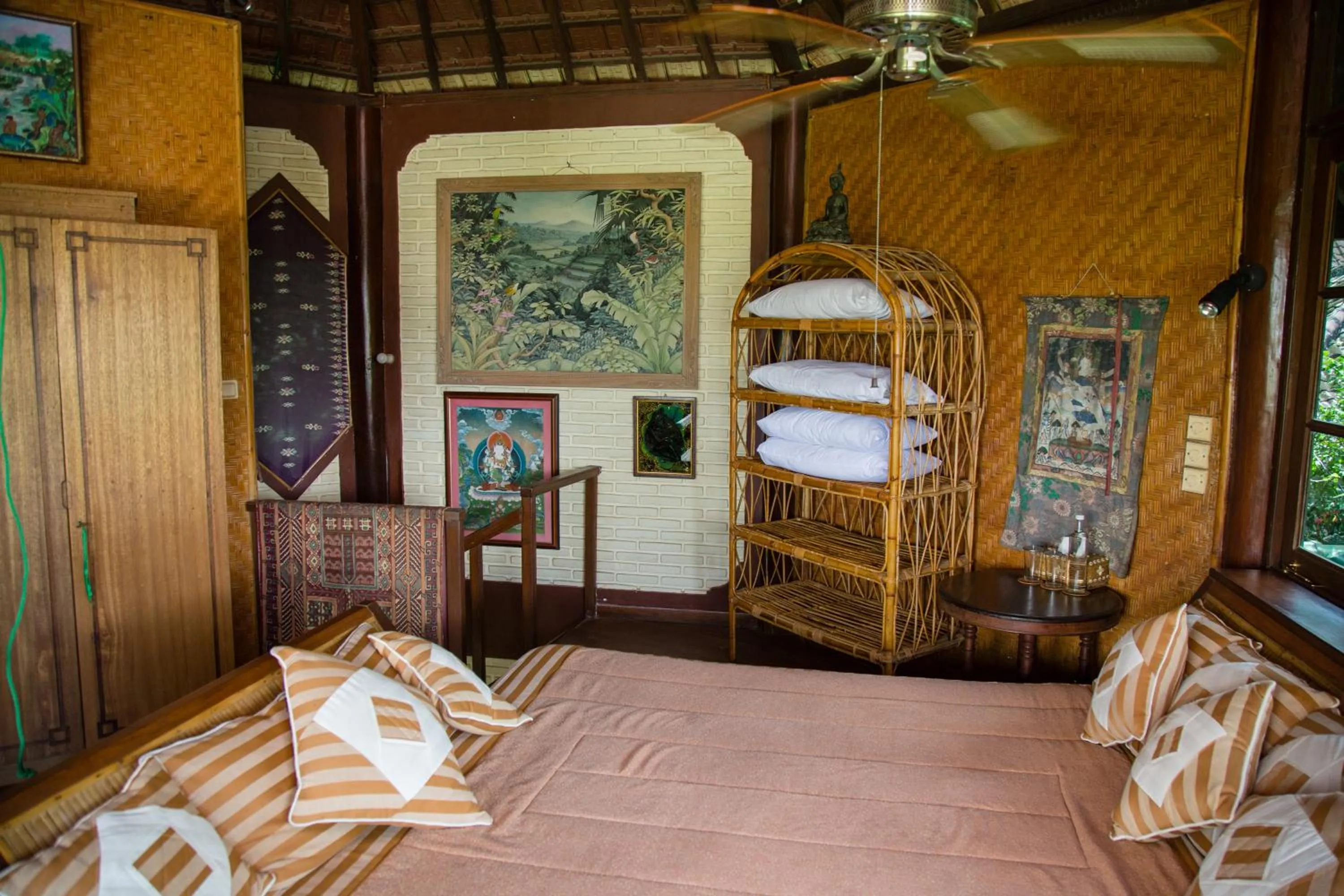 Bed in Tirtagangga Water Palace Villas