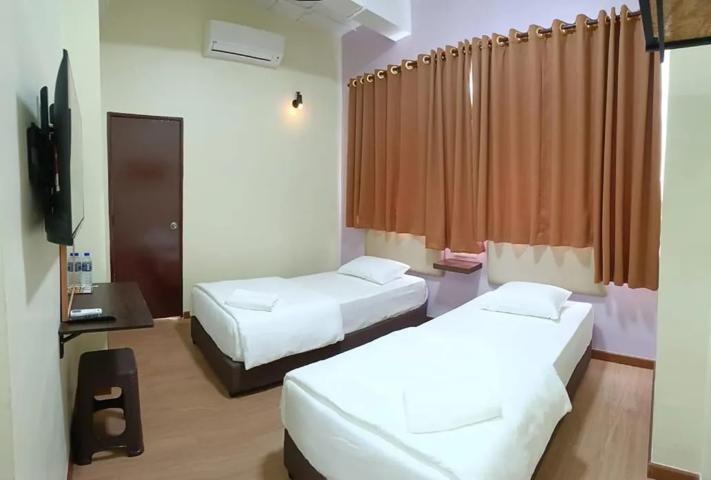 Bed in Hotel Bestari