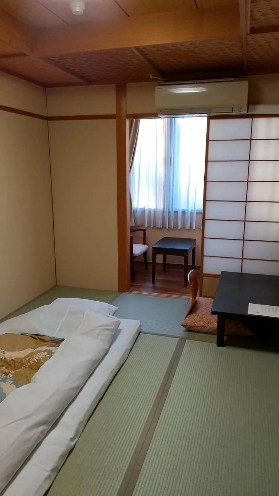 Bed in Ryokan Kousen Kazeya Group