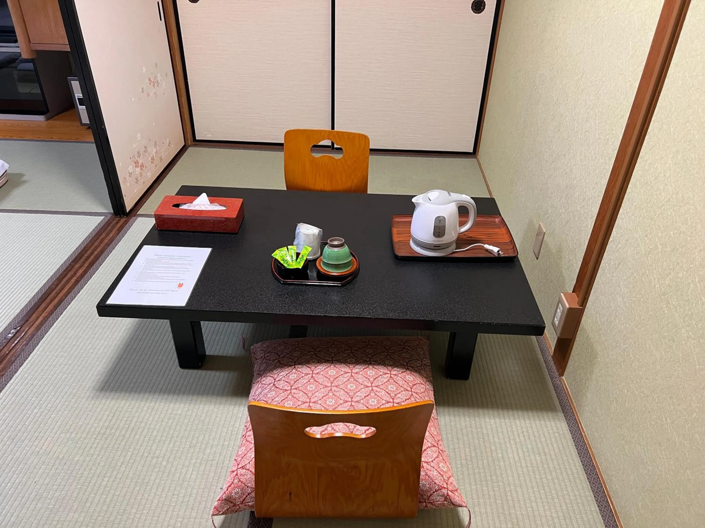 Seating area in Ryokan Kousen Kazeya Group