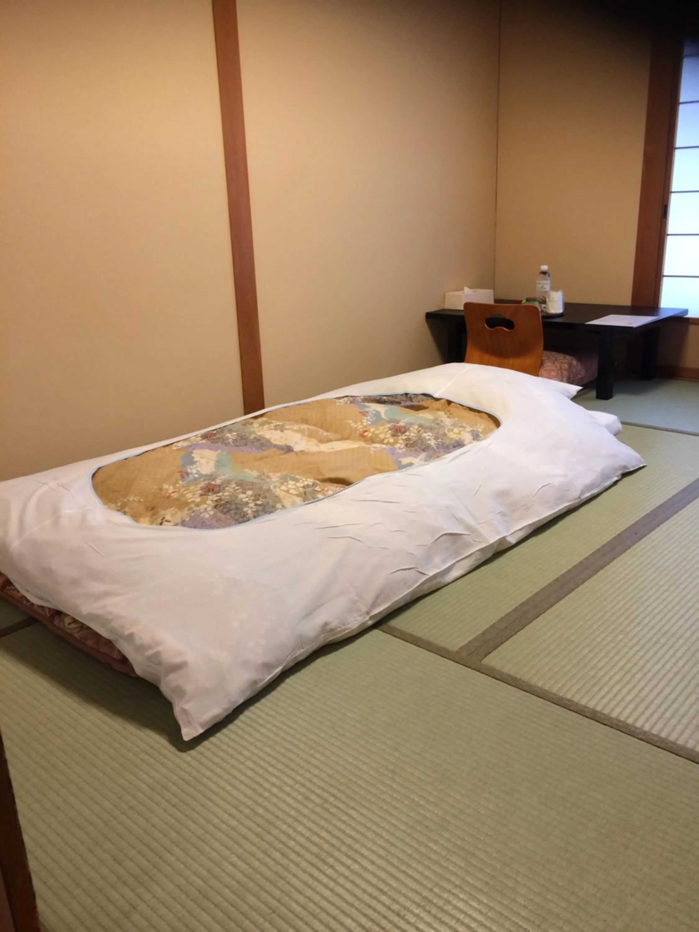 Bed in Ryokan Kousen Kazeya Group