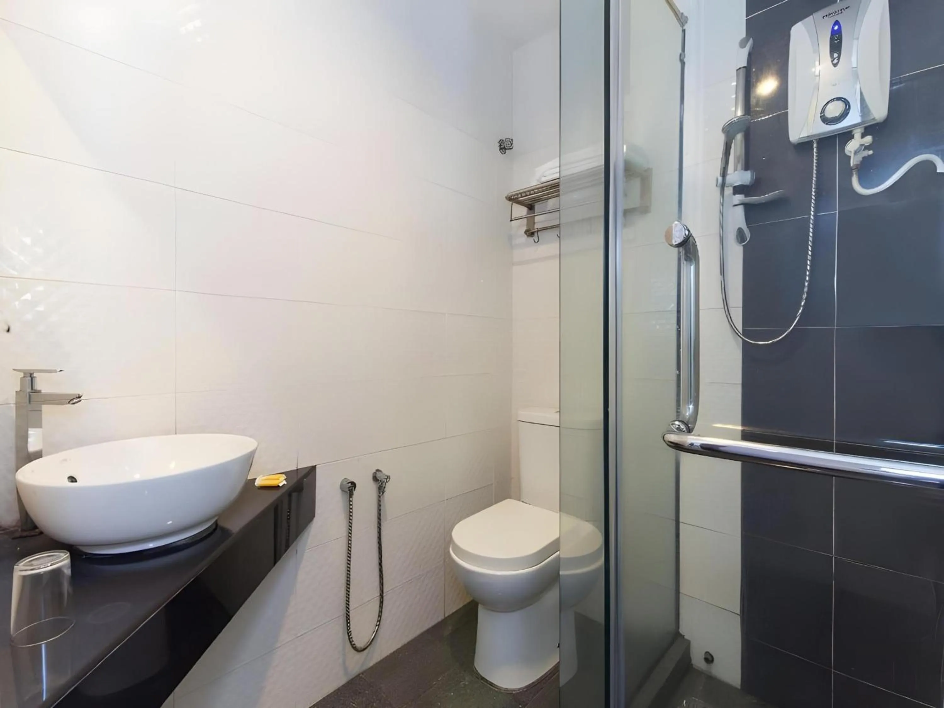 Bathroom in Hotel O Marvelton Hotel