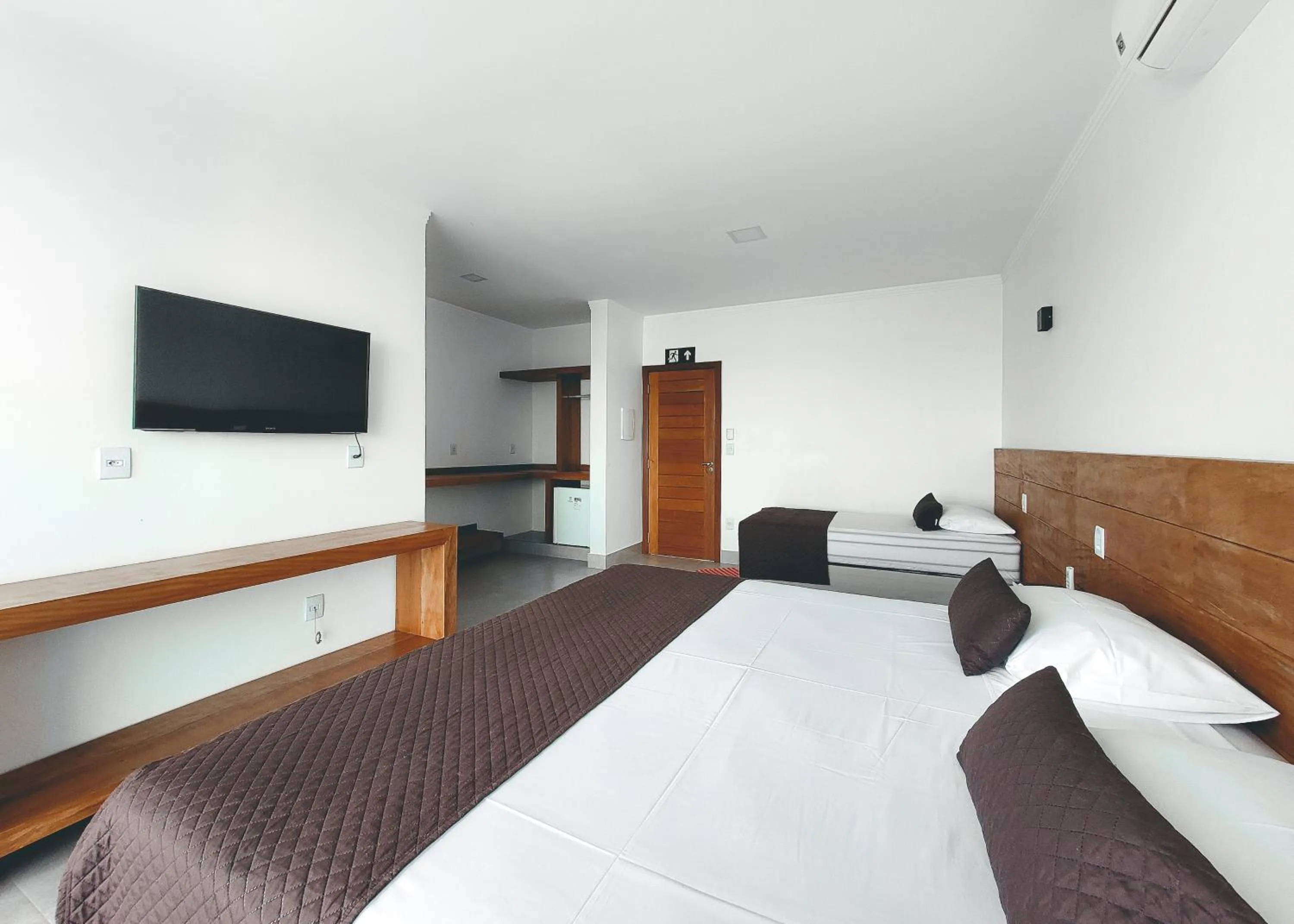 Bed in Riviera Capitólio Hotel