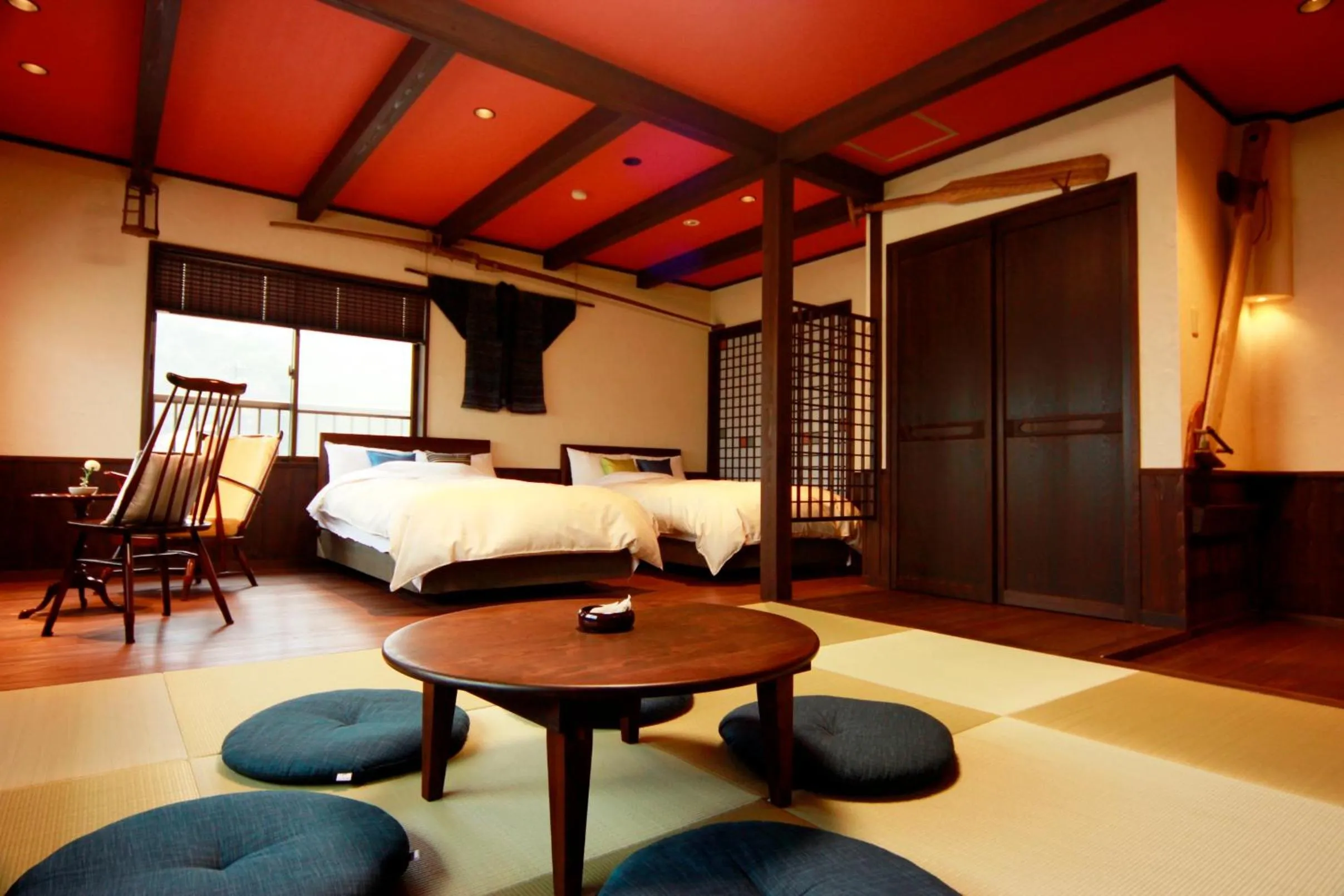 Living room, Bed in Tsuruga Sazanami Resort Chobei