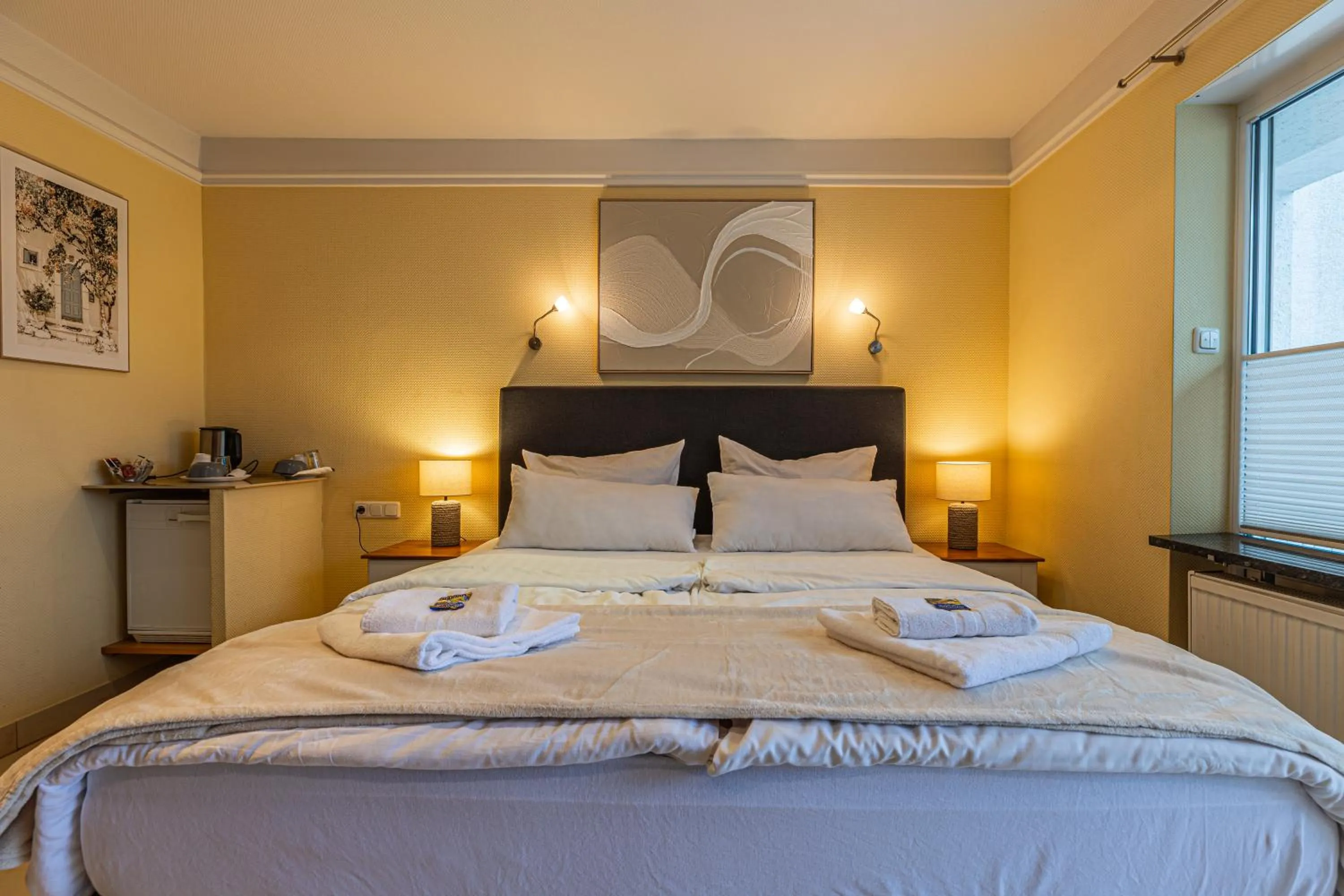 Bed in Gasper Business & Garden Hotel