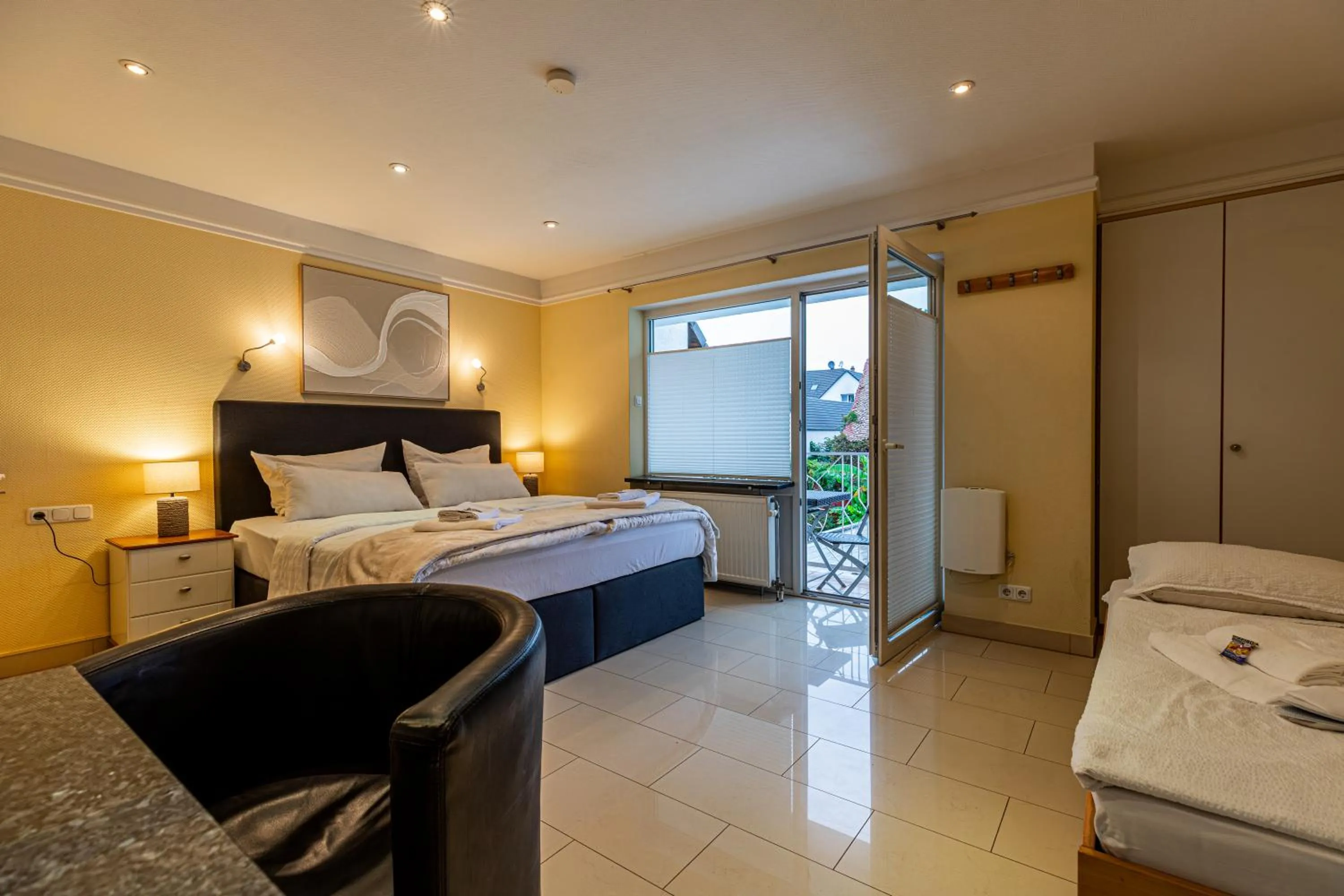 Bed in Gasper Business & Garden Hotel