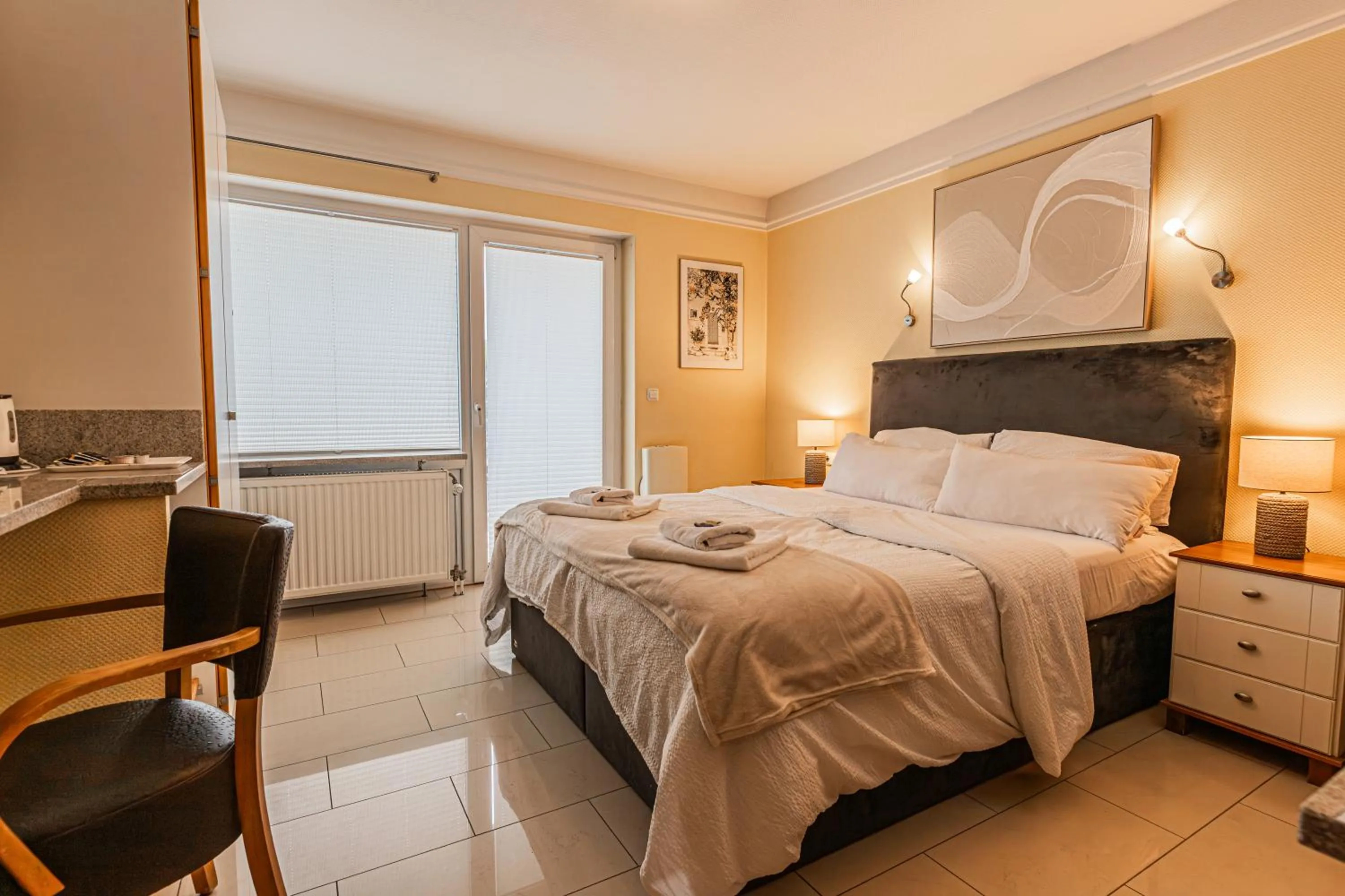 Bed in Gasper Business & Garden Hotel