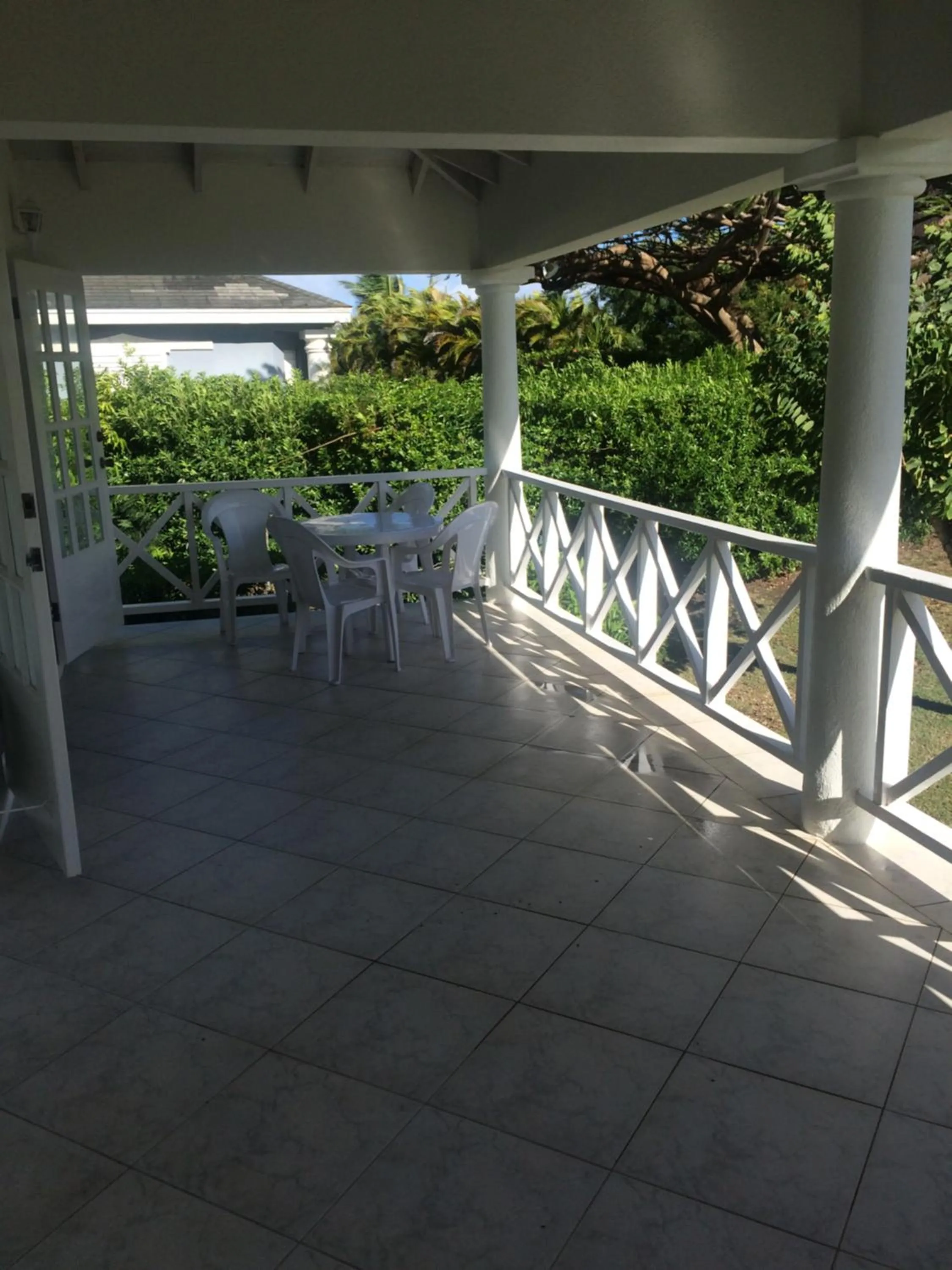 Balcony/Terrace in Spacious White House Villa 1 minute to sandy beaches