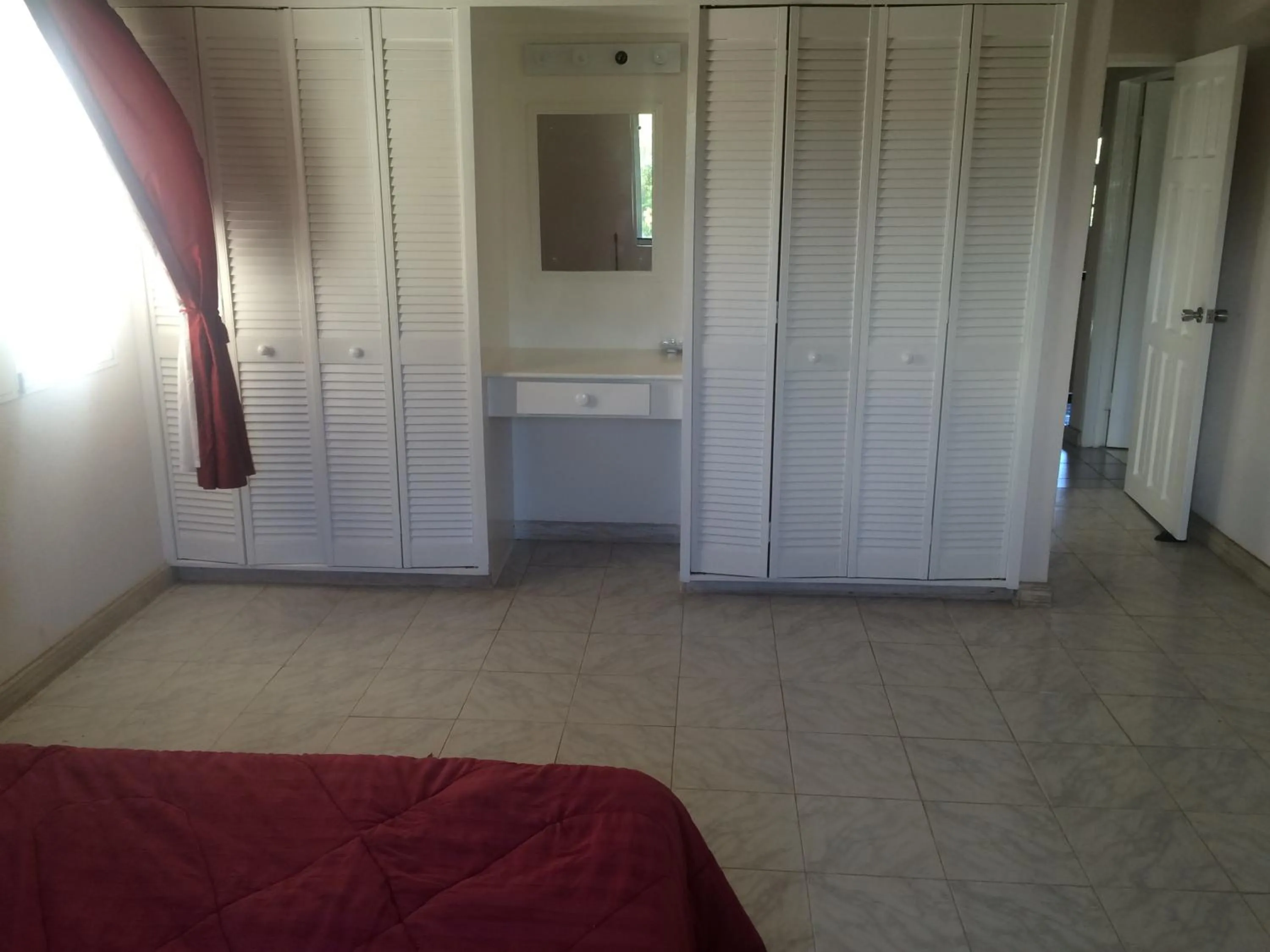 Bedroom in Spacious White House Villa 1 minute to sandy beaches