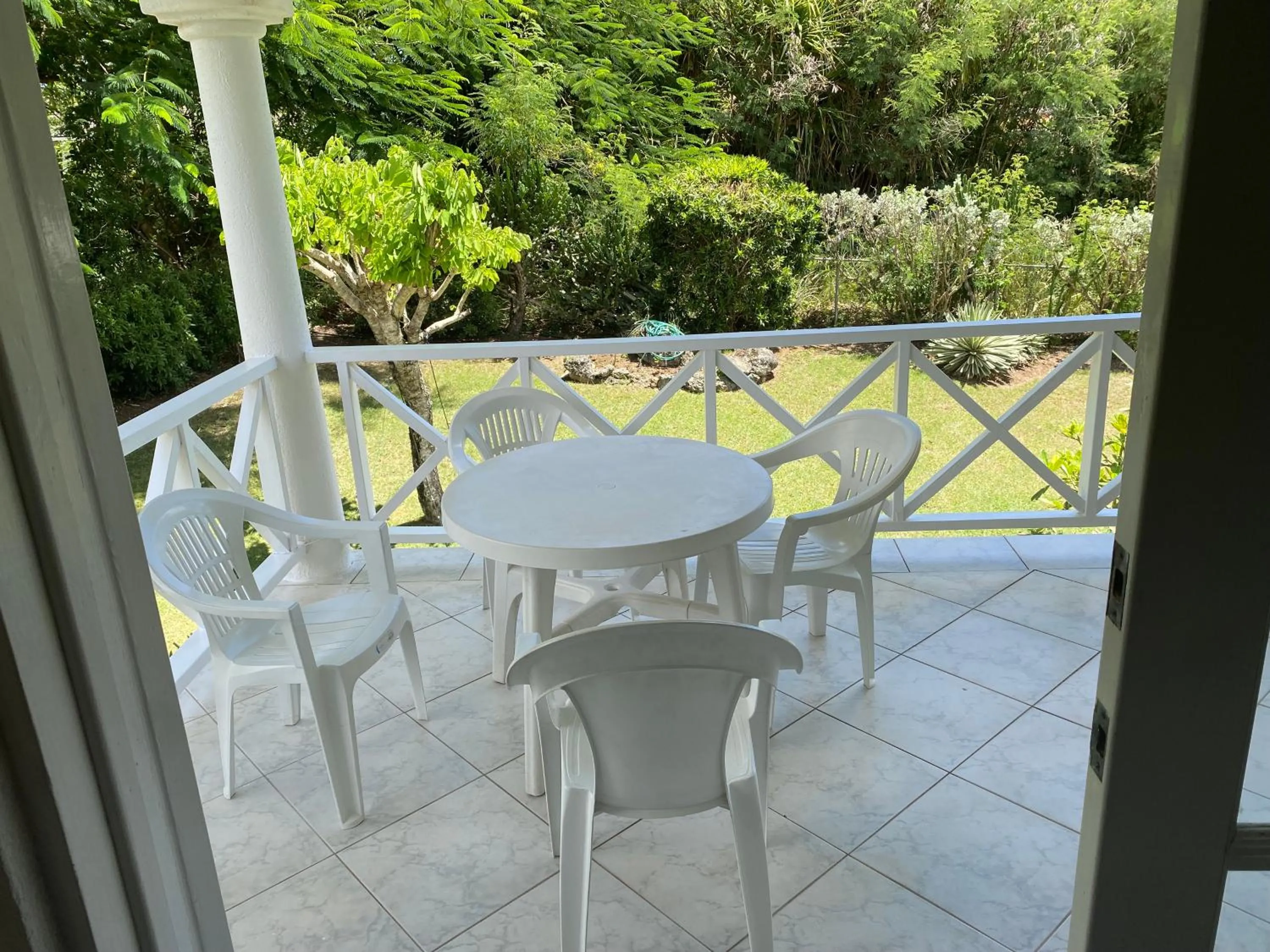 Balcony/Terrace in Spacious White House Villa 1 minute to sandy beaches
