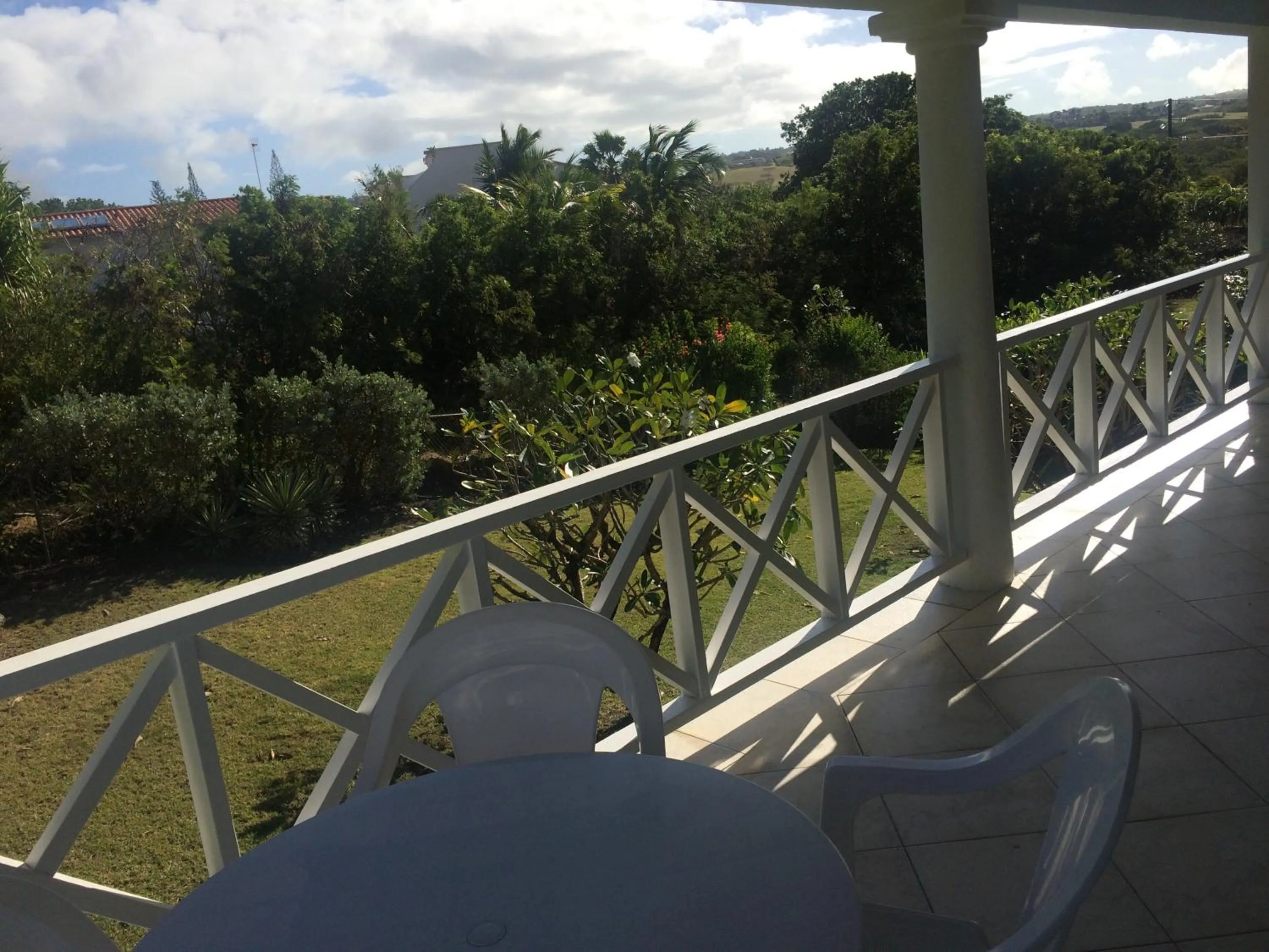 Balcony/Terrace in Spacious White House Villa 1 minute to sandy beaches